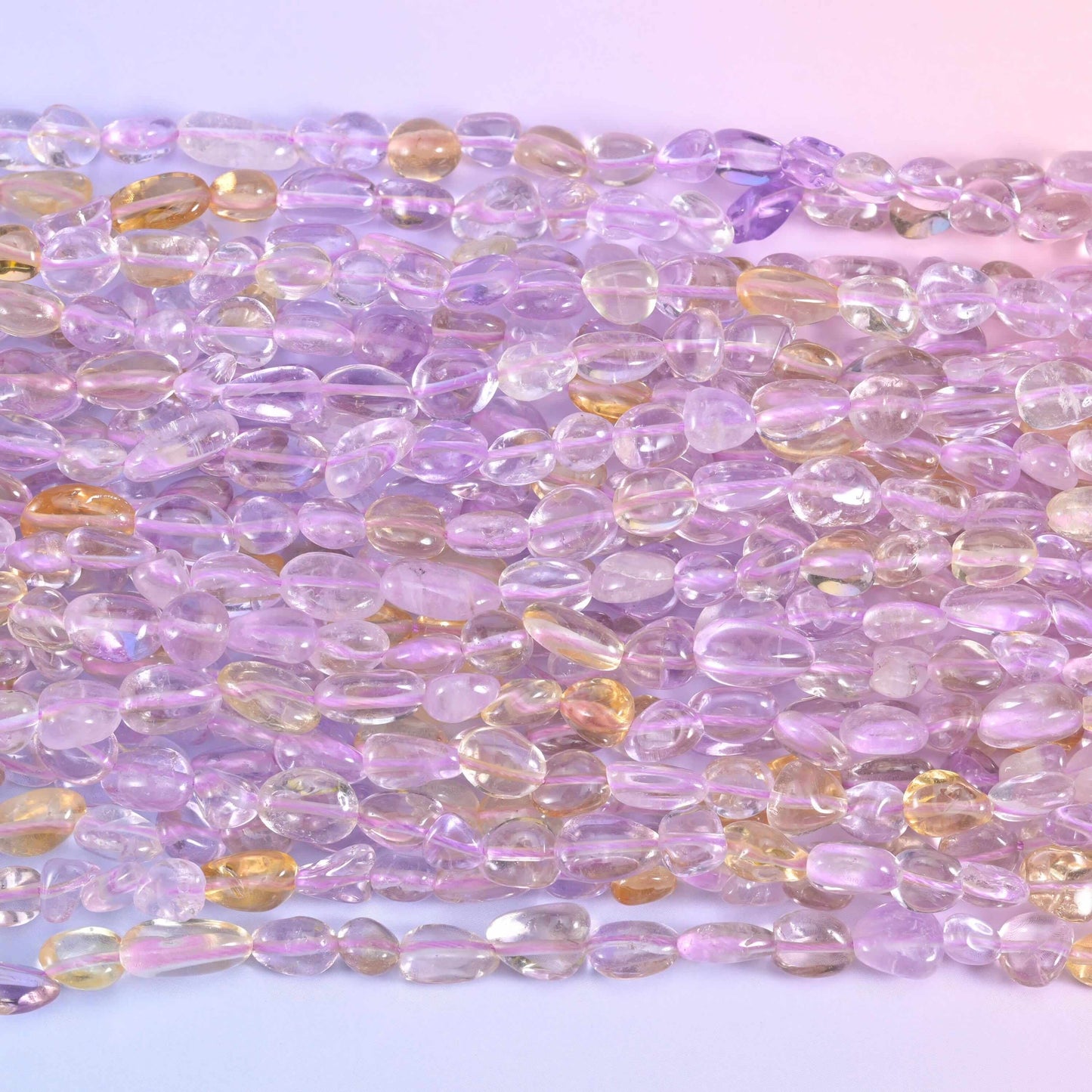 Ametrine pebble nugget gemstone beads.