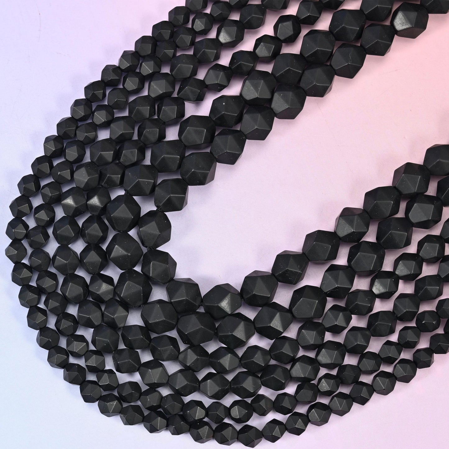 Matte Black Onyx Beads: Faceted Diamond Star Cut, 6-10mm, 15.5 inch Strand