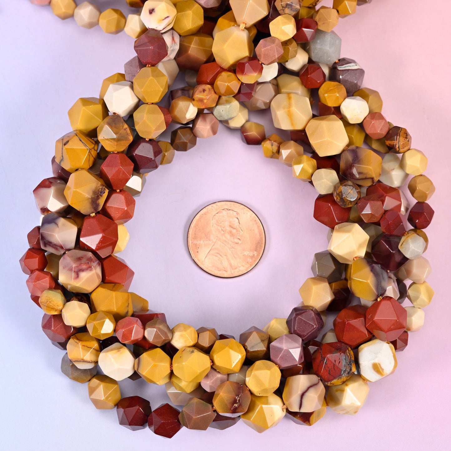 Mookaite Jasper Beads: Faceted Diamond Star Cut, 6-10mm, 15.5 inch Strand