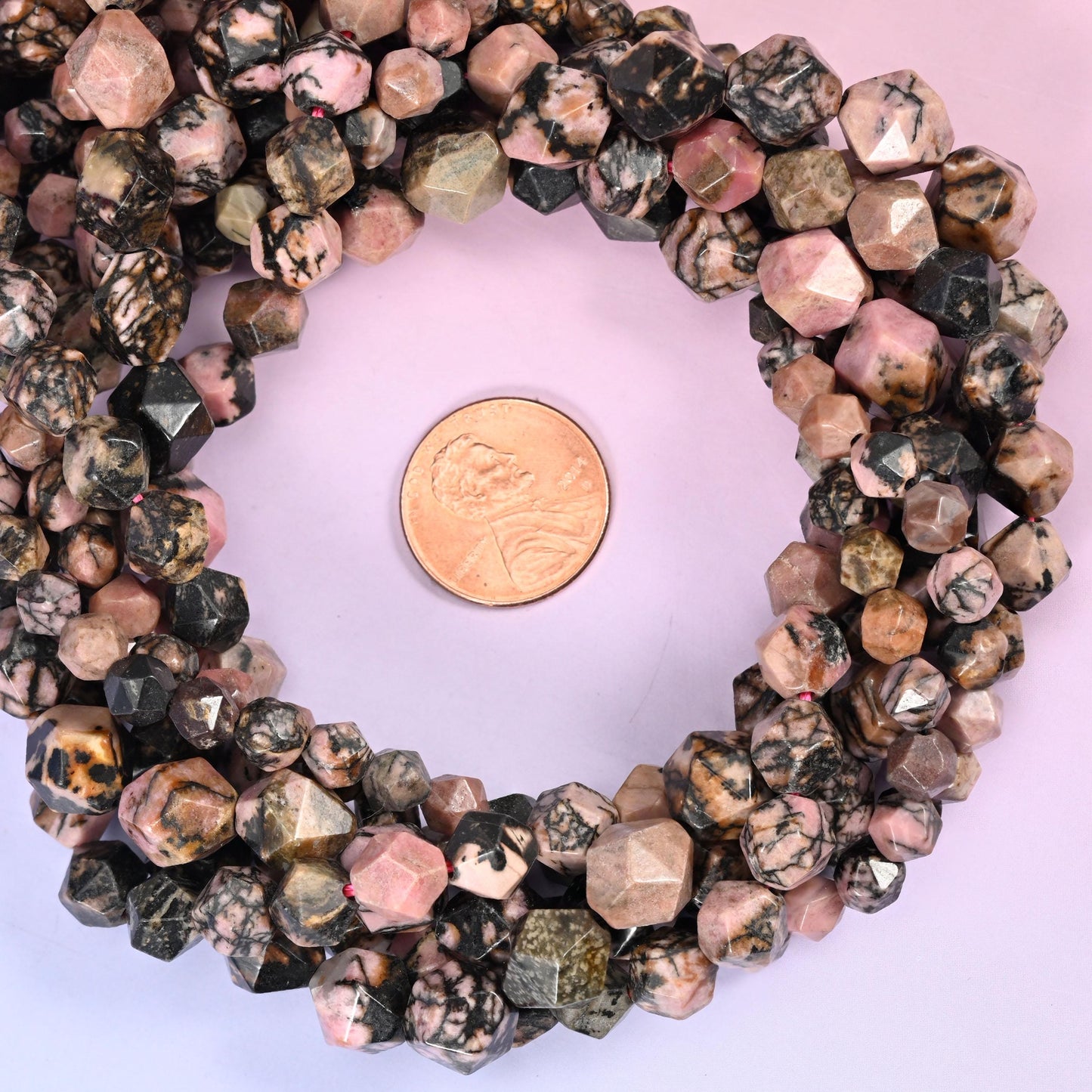 Rhodonite Beads: Faceted Diamond Star Cut, 6-10mm, 15.5 inch Strand