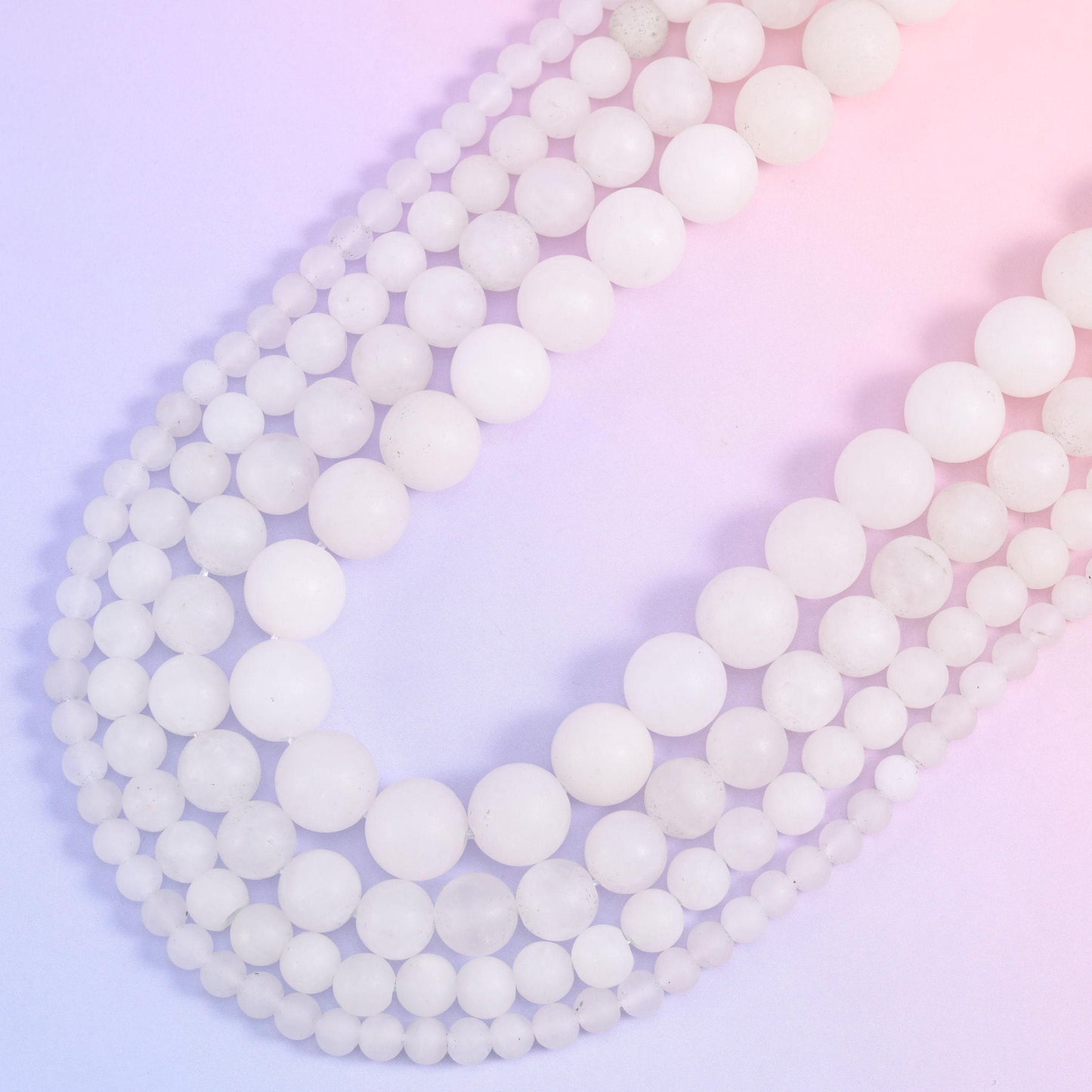 Matte round cut white jade beads