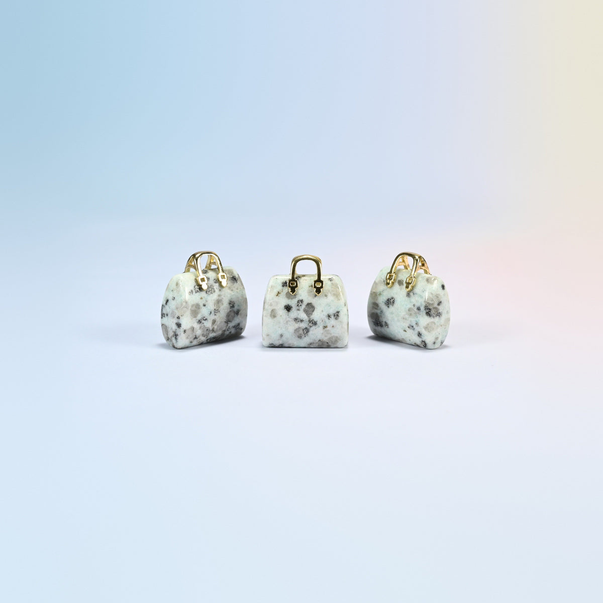 Three kiwi jasper purse crystal carvings, 1 inch, cream and light green natural stone with dark spots, gold-tone handle