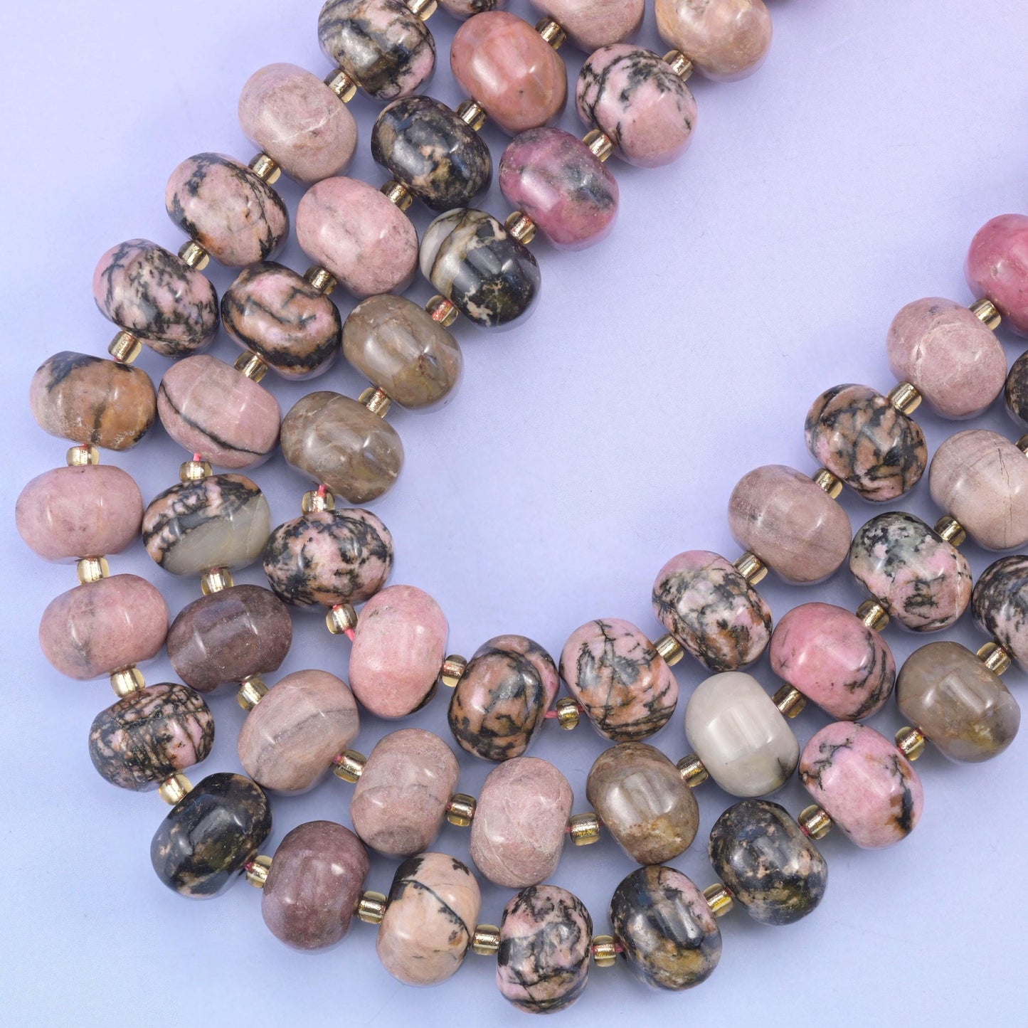Smooth pumpkin cut rhodonite beads