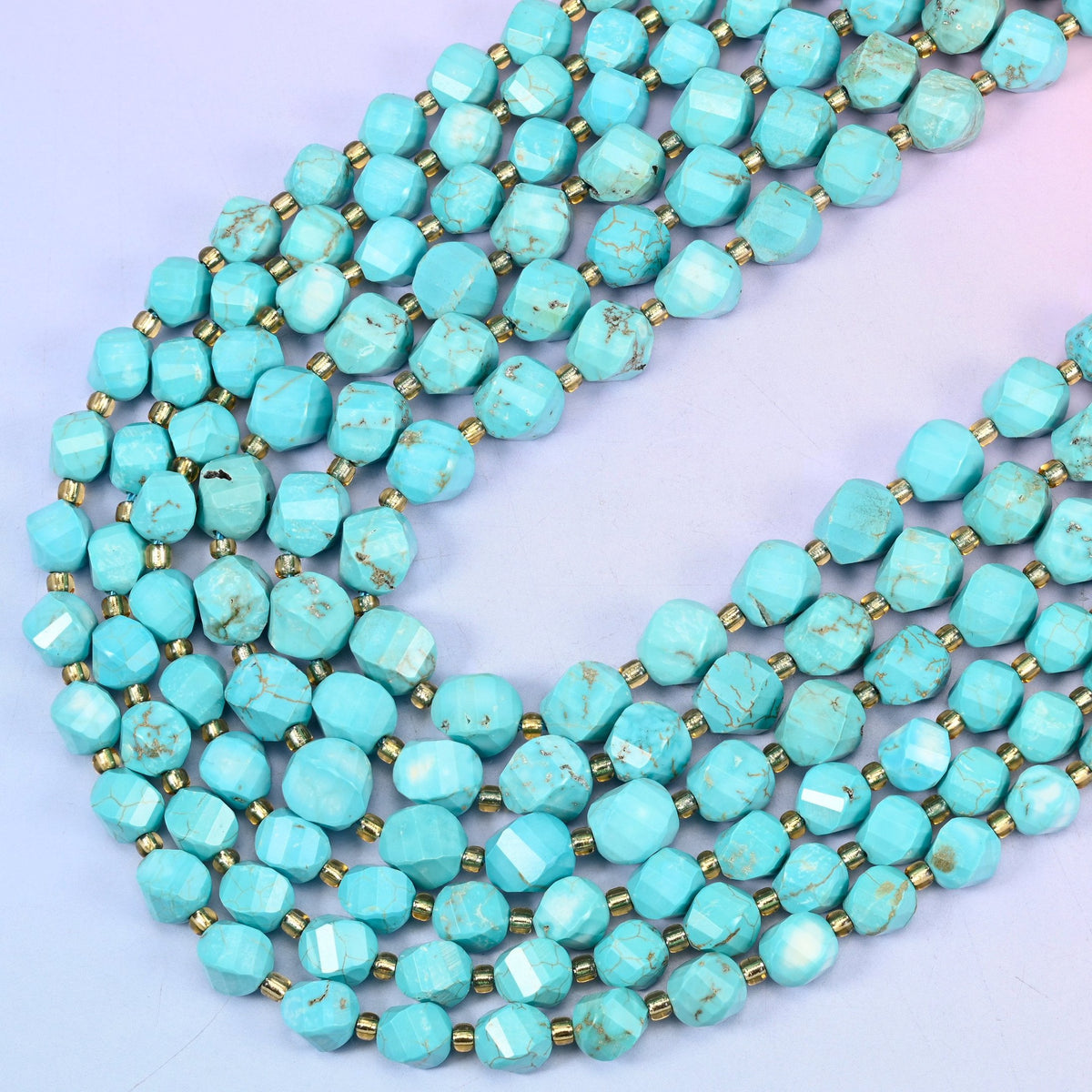 Dyed Light Blue Howlite faceted spiral twist beads, 15 inch strand