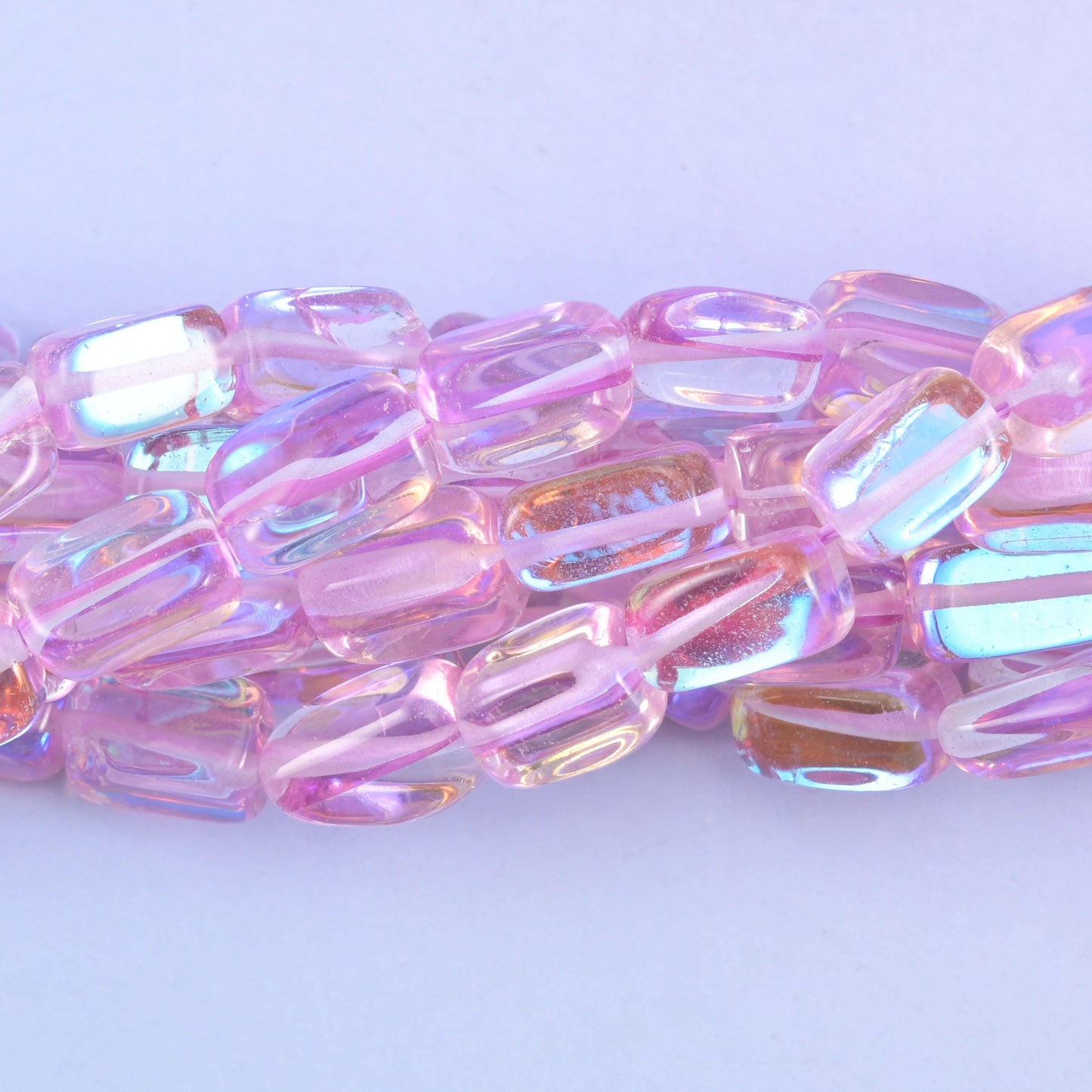 Rectangular cut light purple mystic aura glass beads