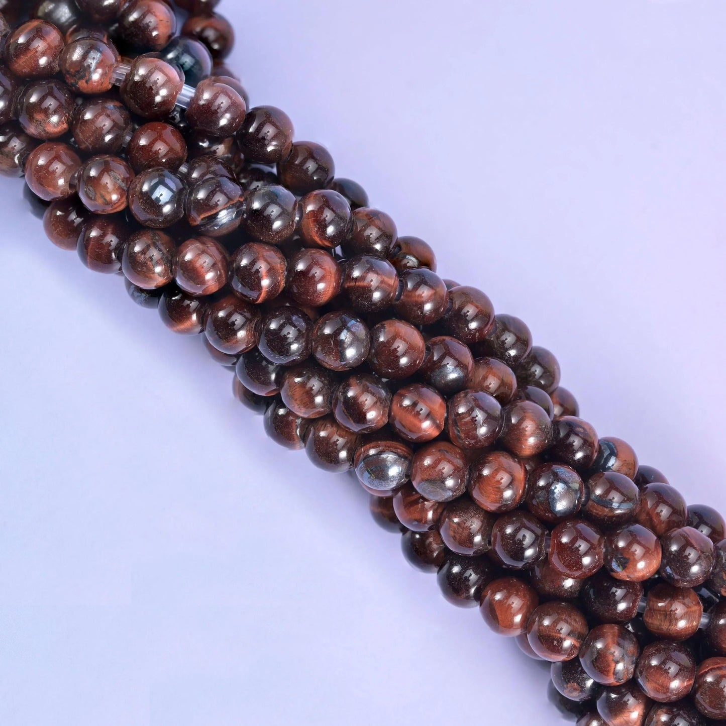 Smooth round cut red tiger eye beads