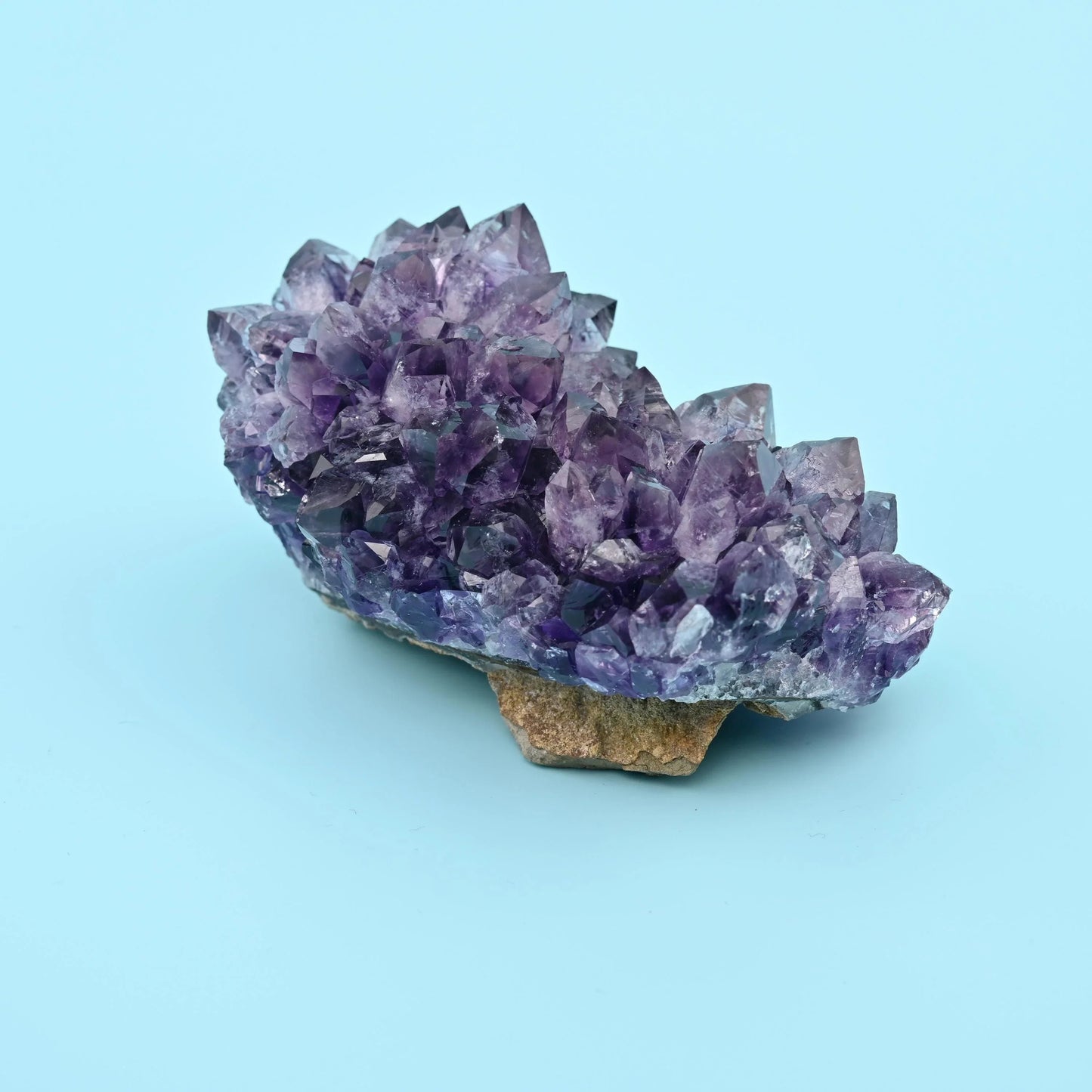 Raw Amethyst Quartz Cluster, smoky grey tips deepening to grape purple at the base.