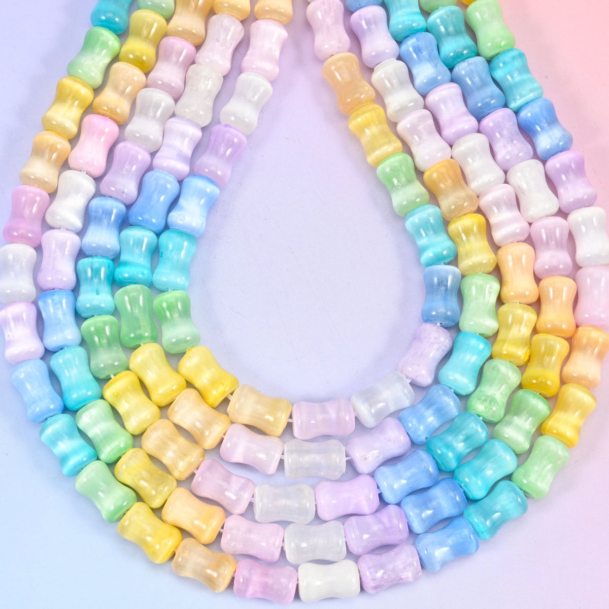 Rainbow Selenite bamboo stem beads for jewelry making.
