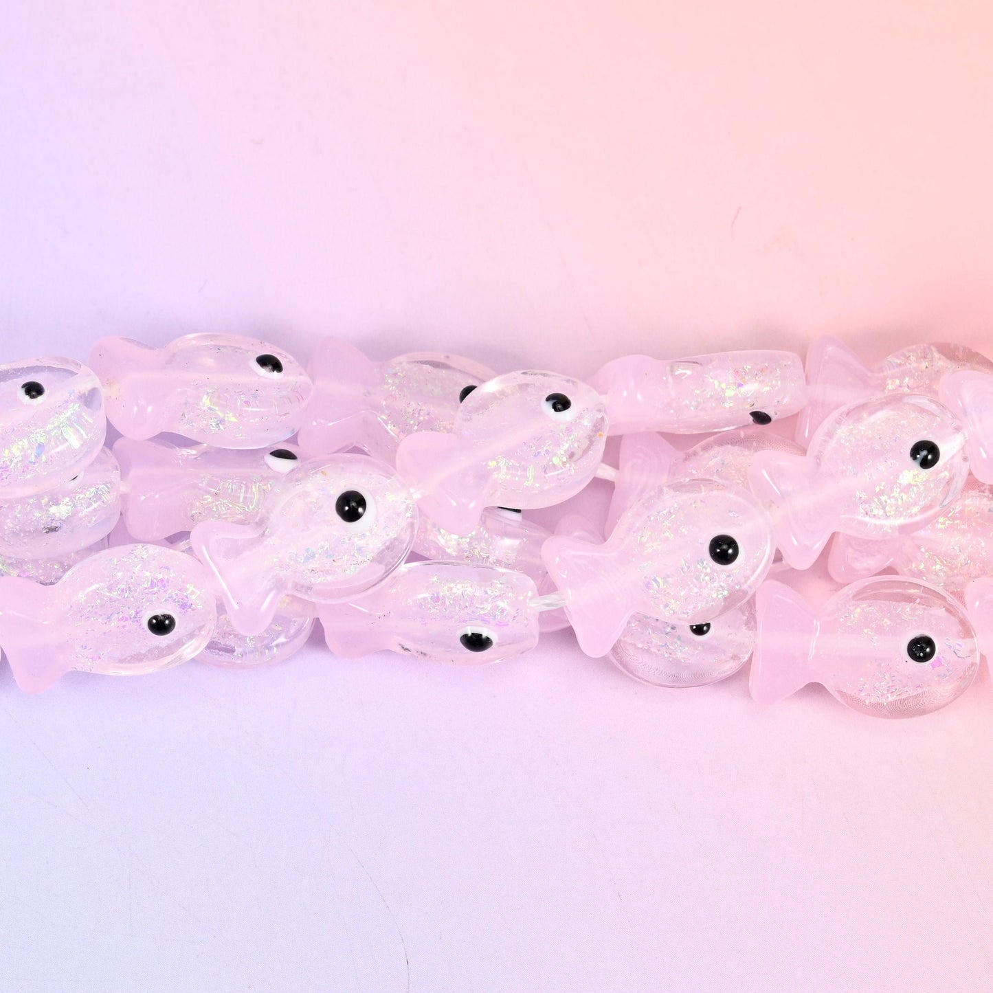 Iridescent Pink Fish Glass Beads, 20 pieces per strand