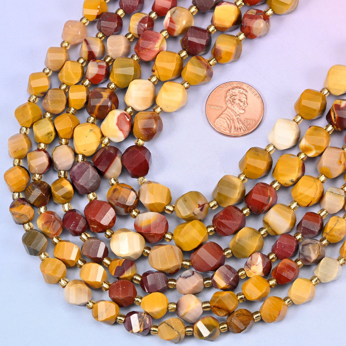 Faceted spiral twist cut natural mookaite jasper beads