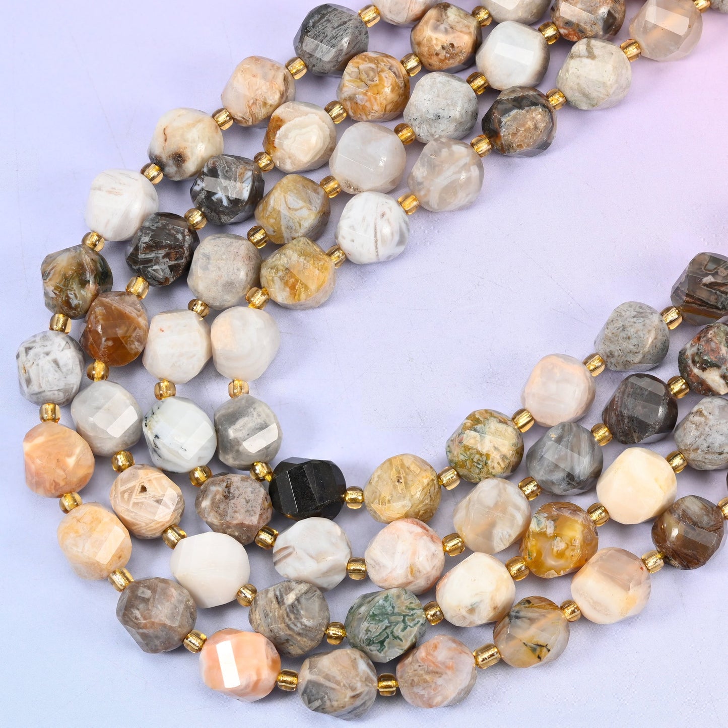Bamboo Agate natural stone beads, many-sided spiral twist cut catching light on every facet, 10mm