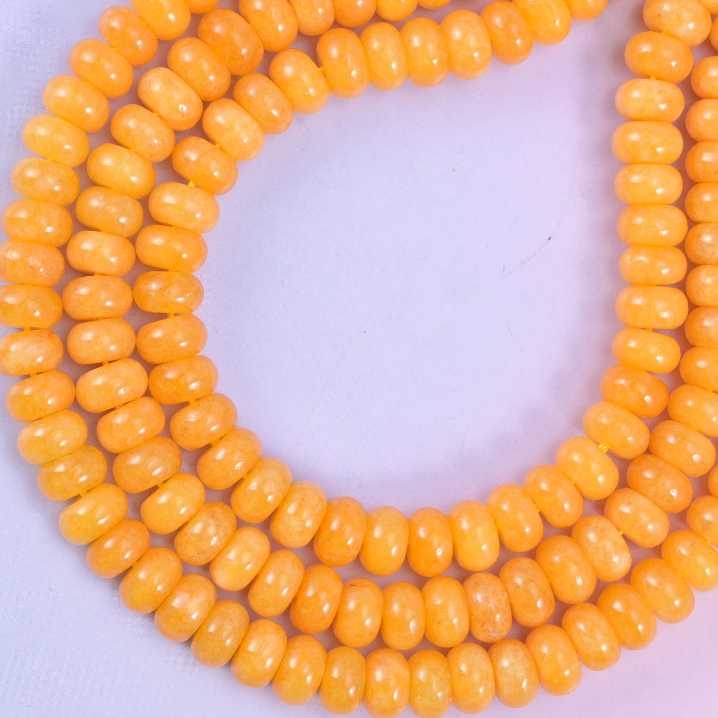 Orange Dyed Jade rondelle beads, approximately 75 beads per strand