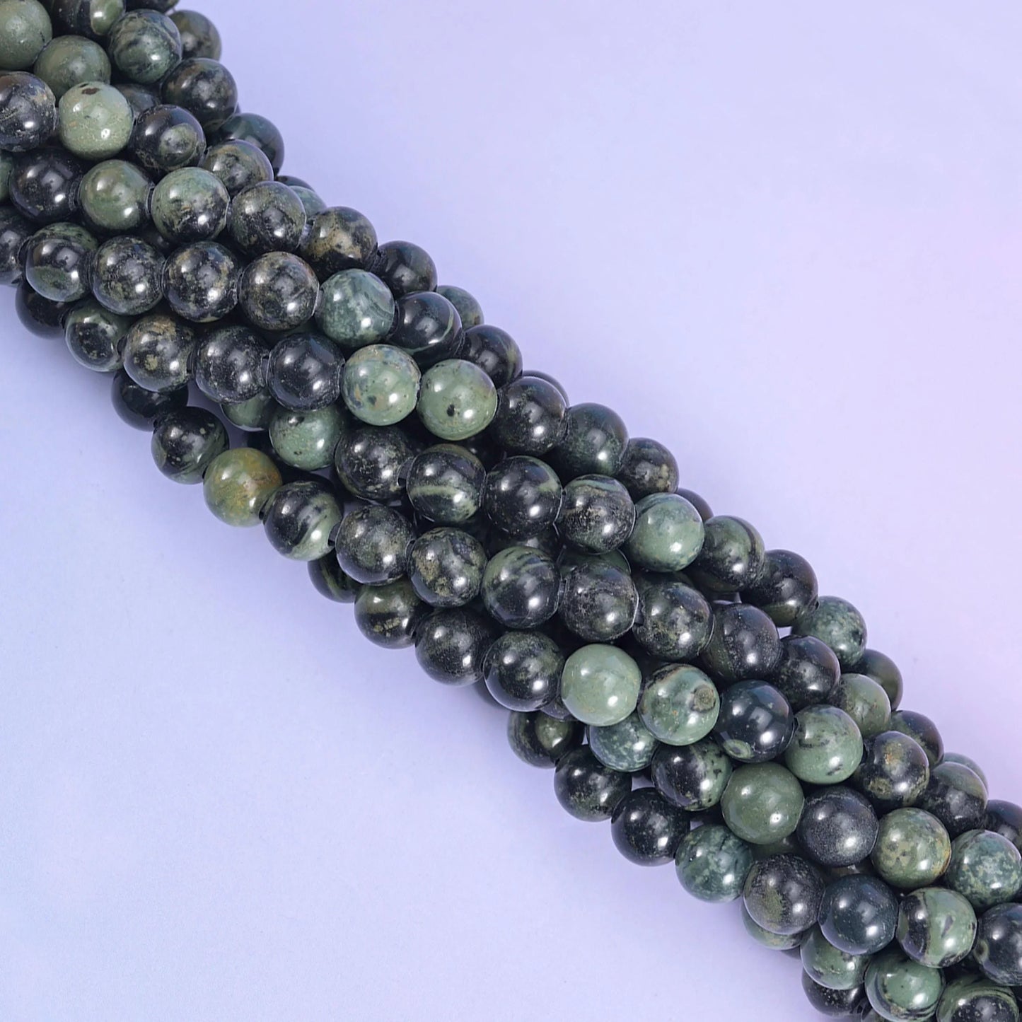 Smooth round cut kambaba jasper beads