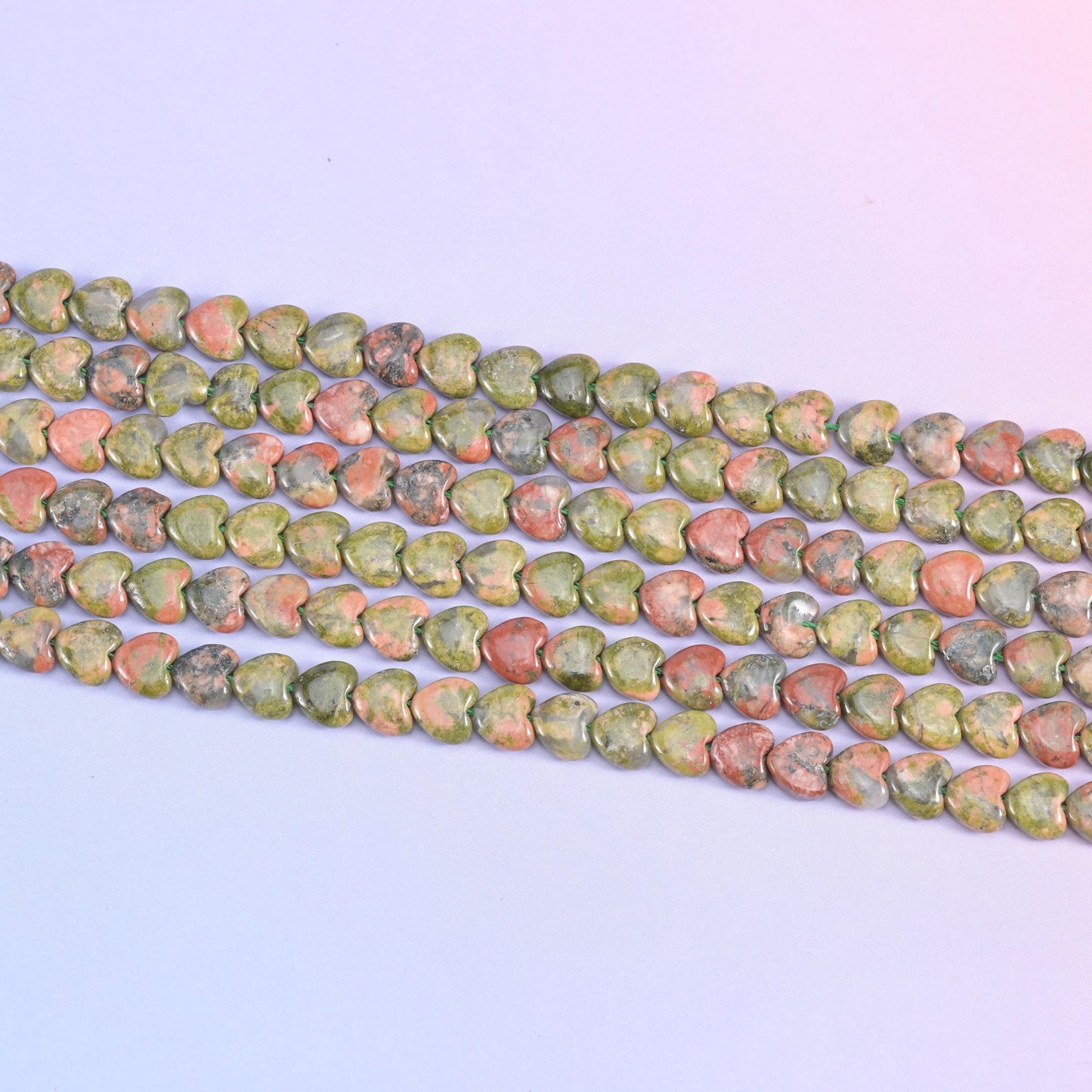 Green Unakite Heart Beads in mossy olive green with salmon-pink and dark grey flecks
