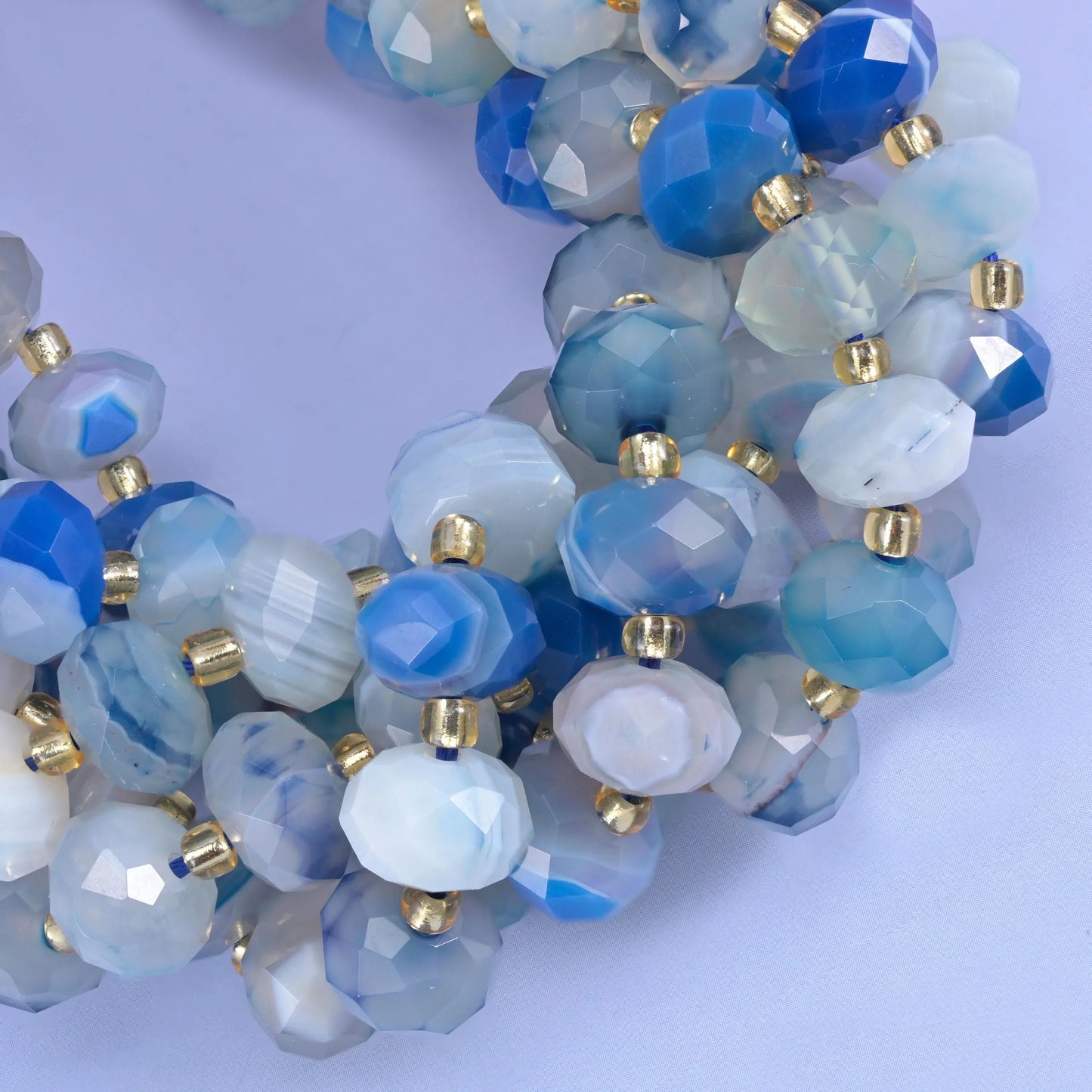 Faceted rondelle cut dyed blue stripe agate beads
