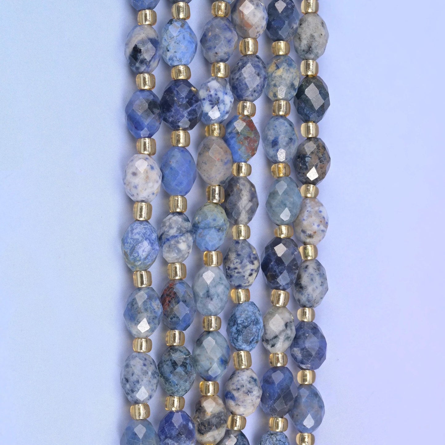 Sunset Dumortierite Faceted Rice Barrel Beads, 15.5 inch strand