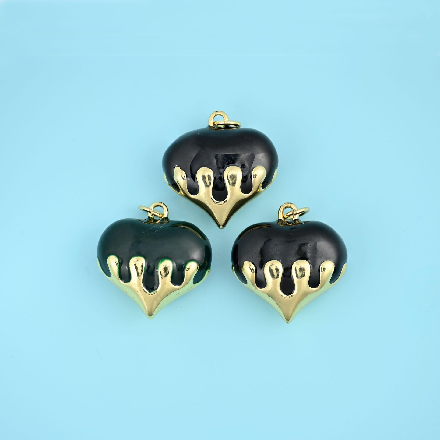 Brass beads, puffy heart with a gold drip finish, 20.33 x 19.88mm
