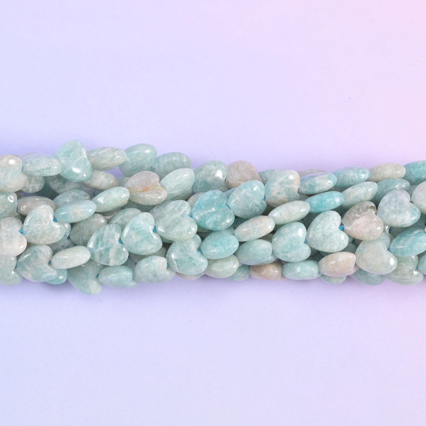 Macro view of Amazonite hearts showing their small puffed profile