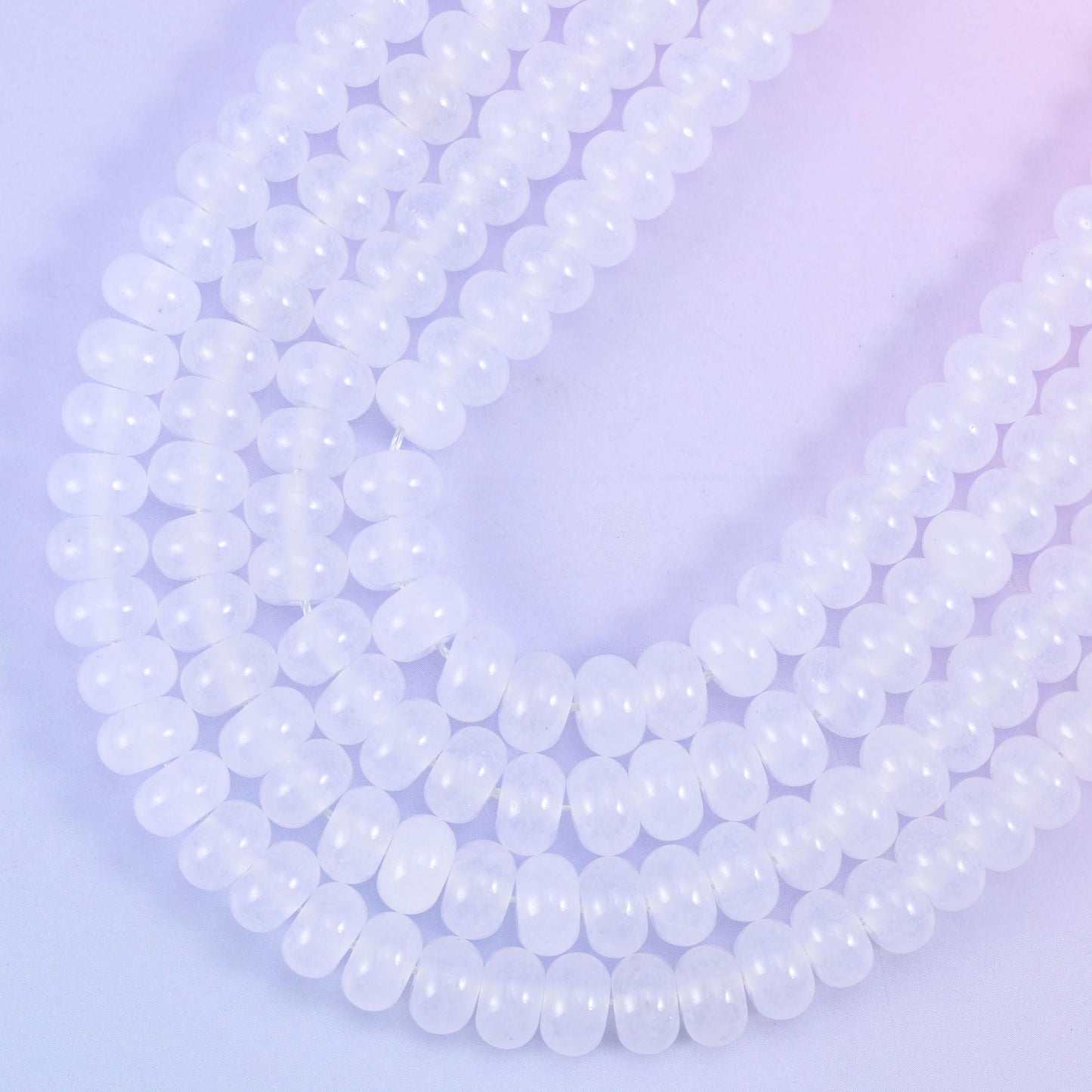 White Dyed Jade rondelle beads, approximately 75 beads per strand