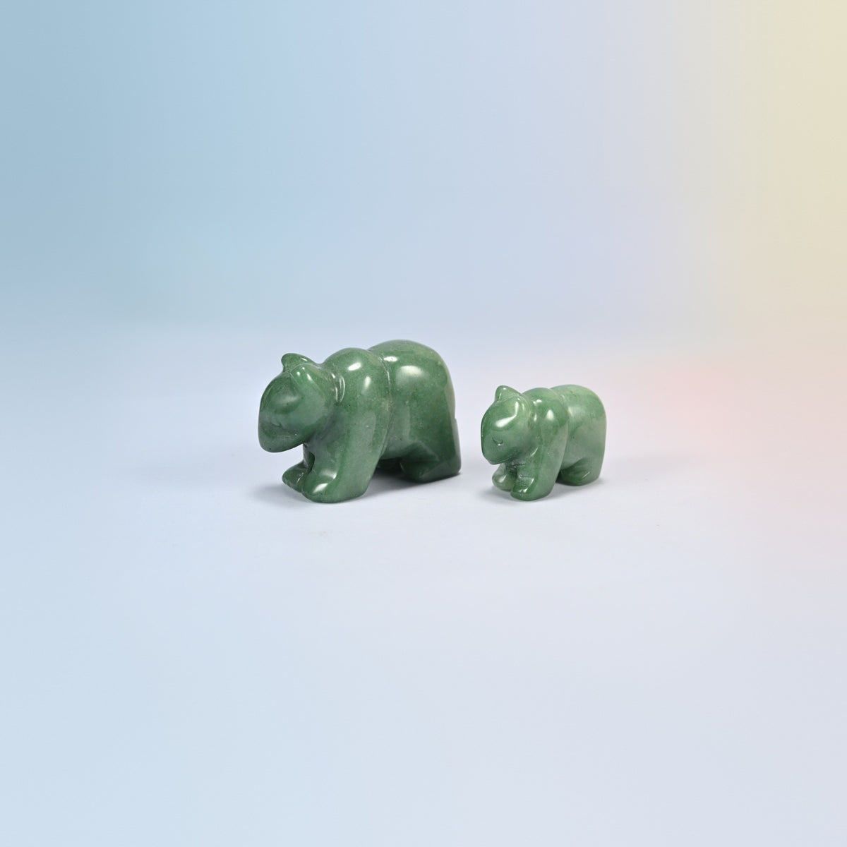 A 2 inch and a 1.5 inch green aventurine bear crystal carving, green natural stone