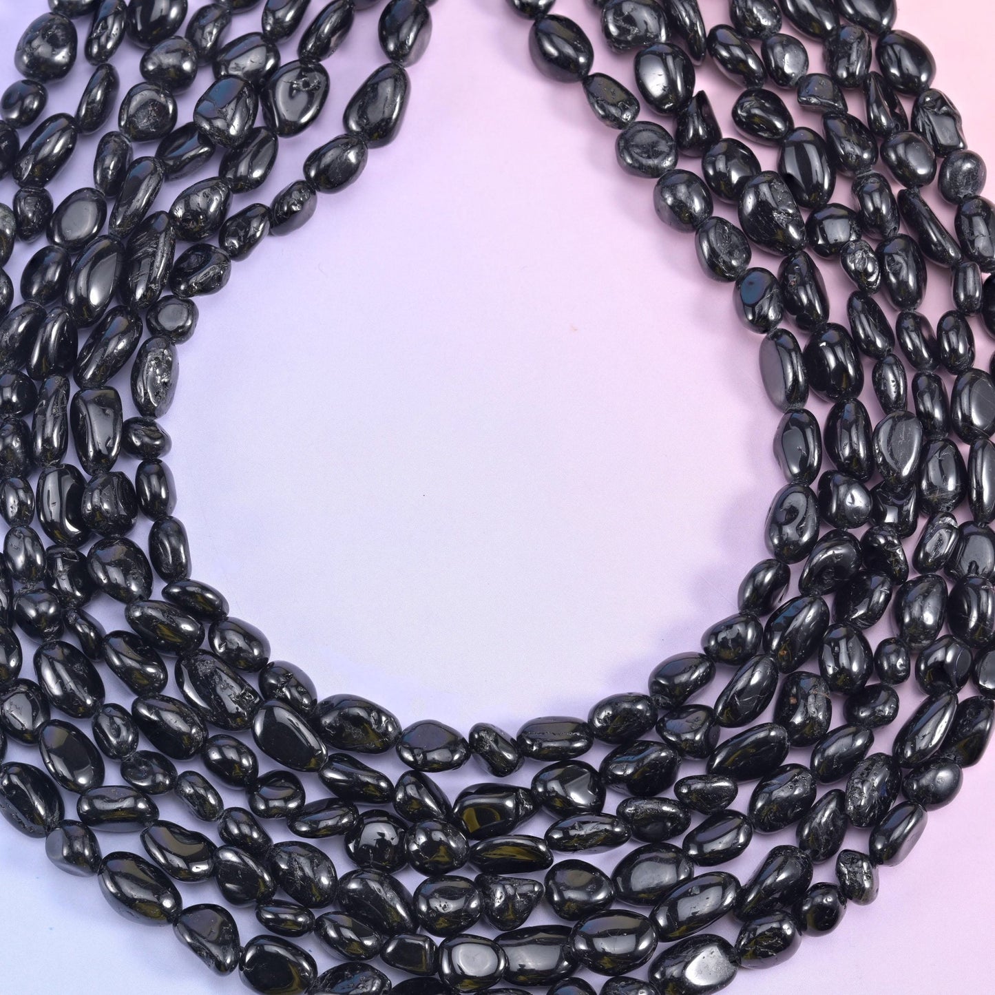 Looped black tourmaline nugget strands showing the full 15.5 inch length