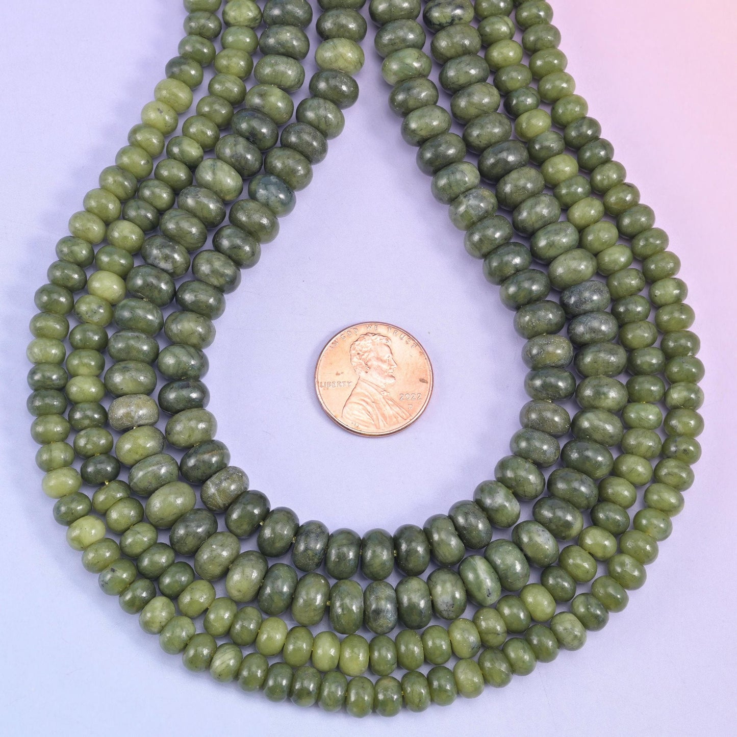 Natural South Green Jade smooth rondelle beads in rich olive to deep forest green with subtle dark veining