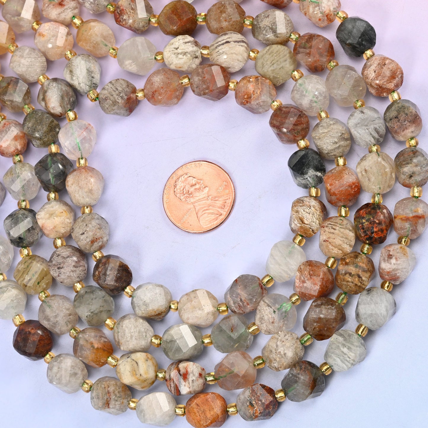 Thousand Layer Phantom Quartz natural crystal beads, 10mm faceted spiral twist beads on a full 15 inch strand