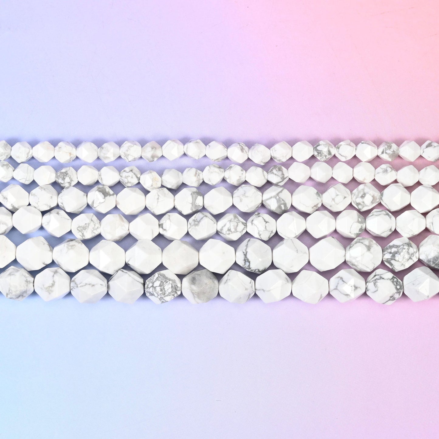 White Howlite in bright chalk white crossed by fine grey webbing
