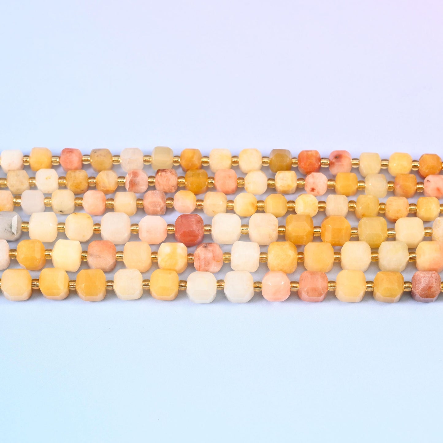 Gold Silk Jade Faceted Cube Beads in warm apricot, honey, cream and dusty rose