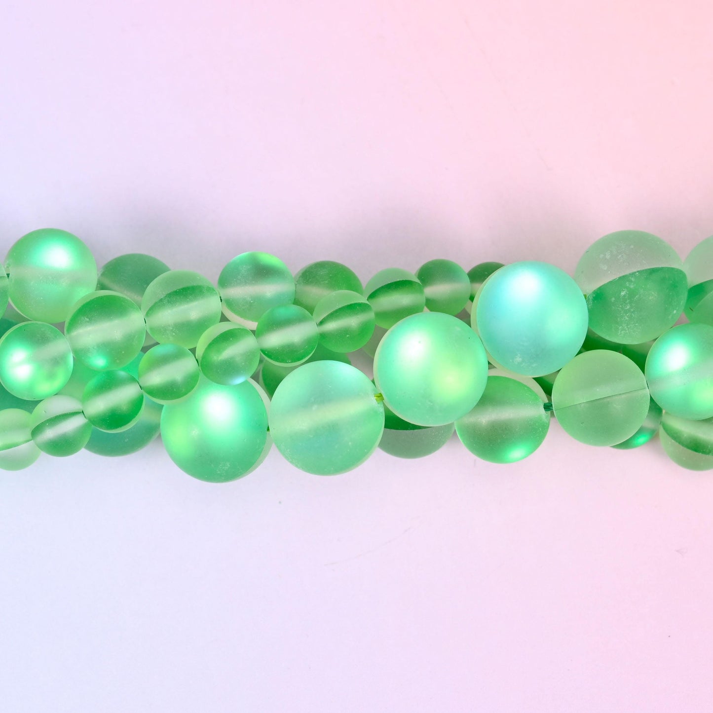Fresh apple green glass beads with a frosted sea-glass surface