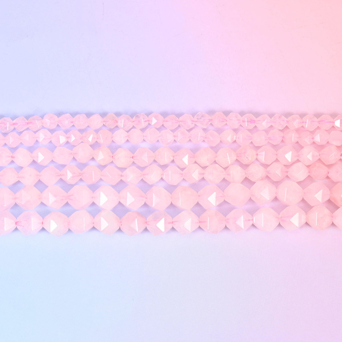 Rose Quartz in pale blush pink, milky and softly translucent