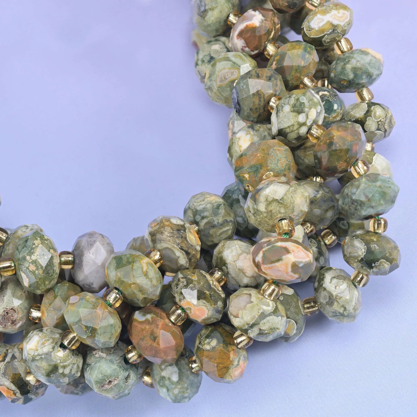 Faceted rondelle cut snake skin jasper beads