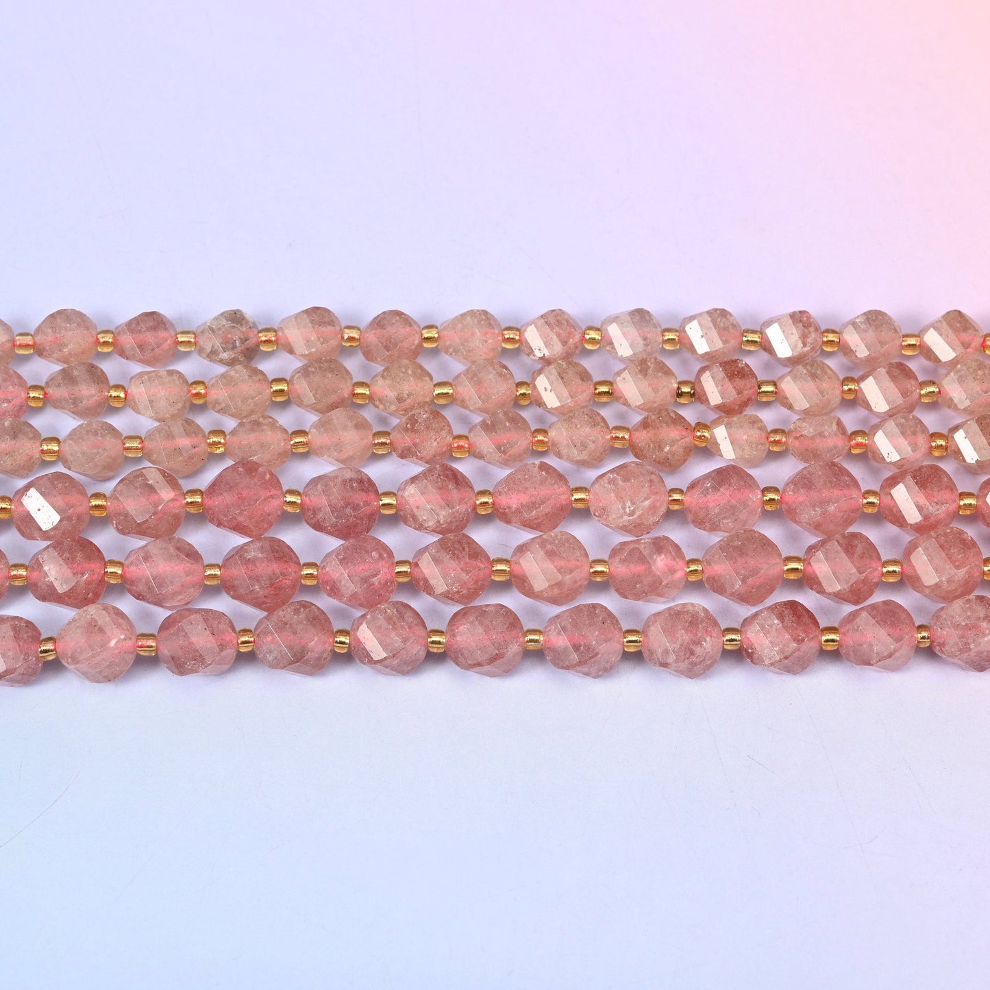 Strawberry Quartz beads in dusty rose flecked with fine silvery-red inclusions