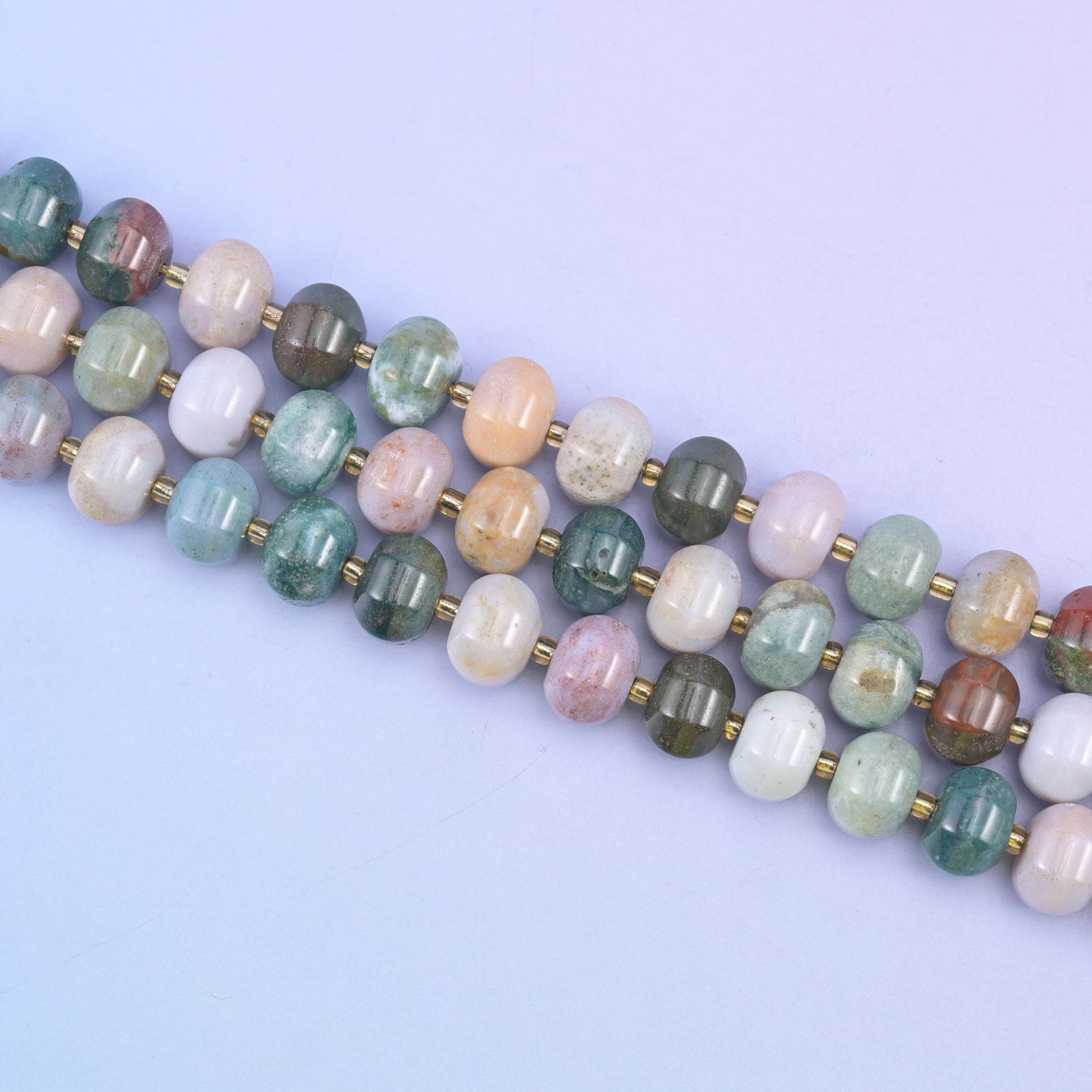 Indian agate beads in a mix of green, brown, cream and rust