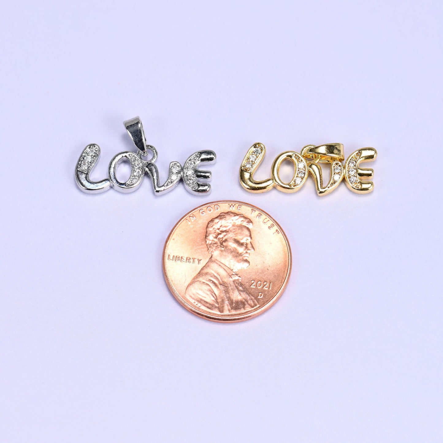 Cursive Love script charm with zircon pave accents