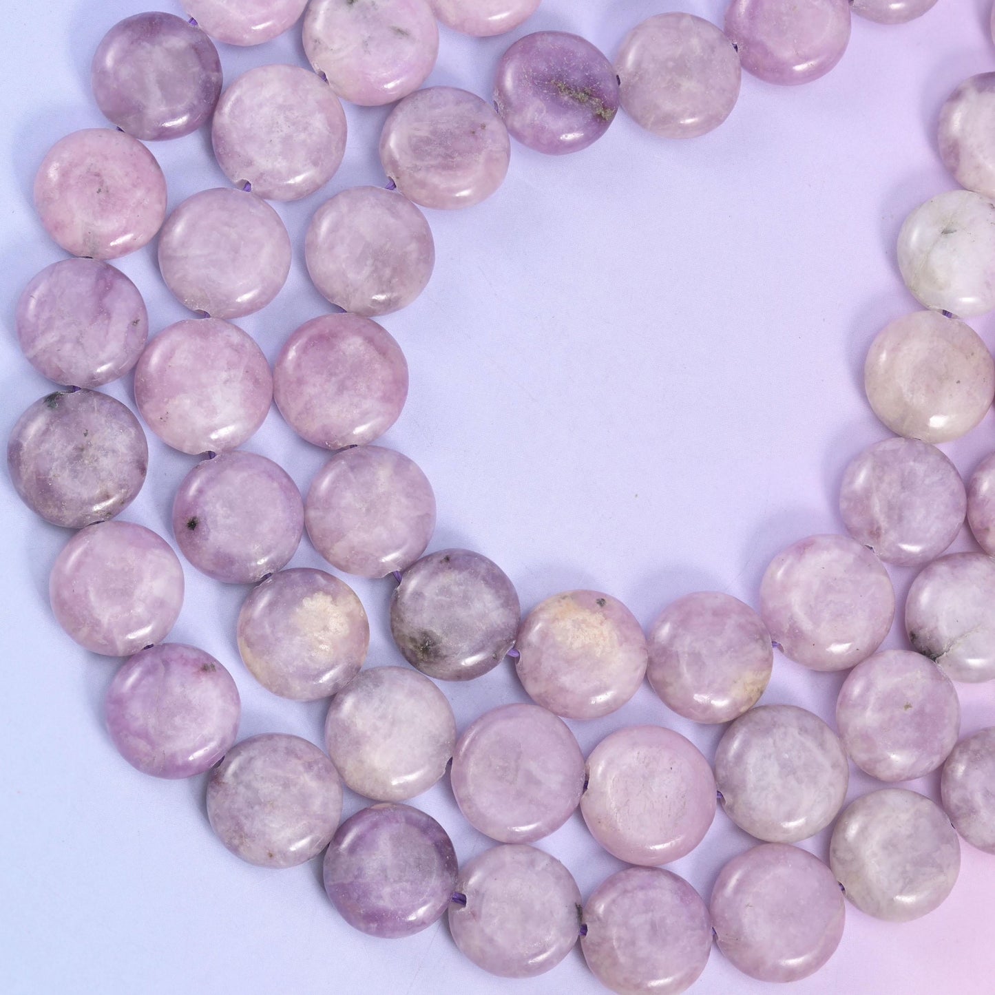 Lepidolite coin beads, approximately 26 beads per strand