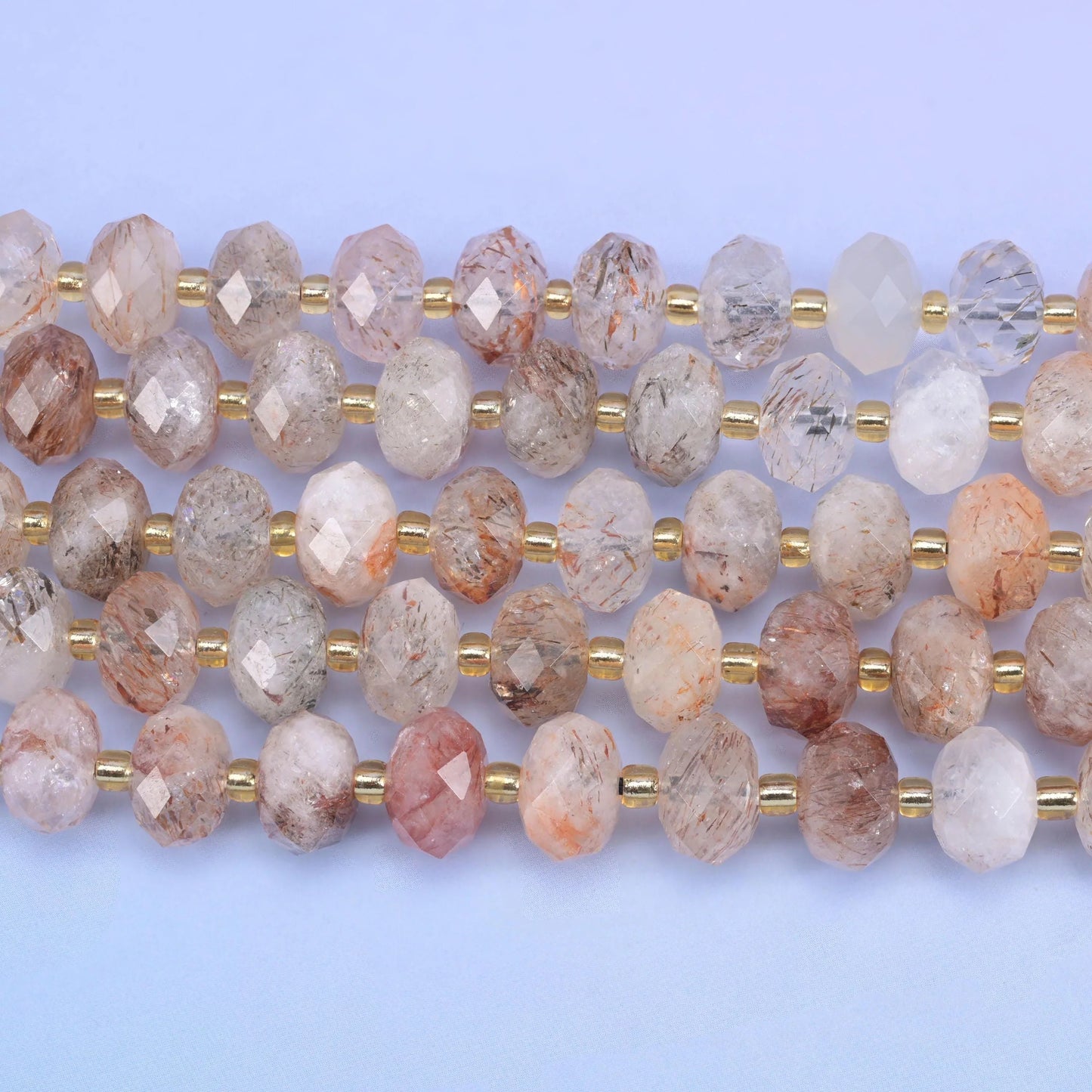 Faceted rondelle cut red copper rutilated quartz beads