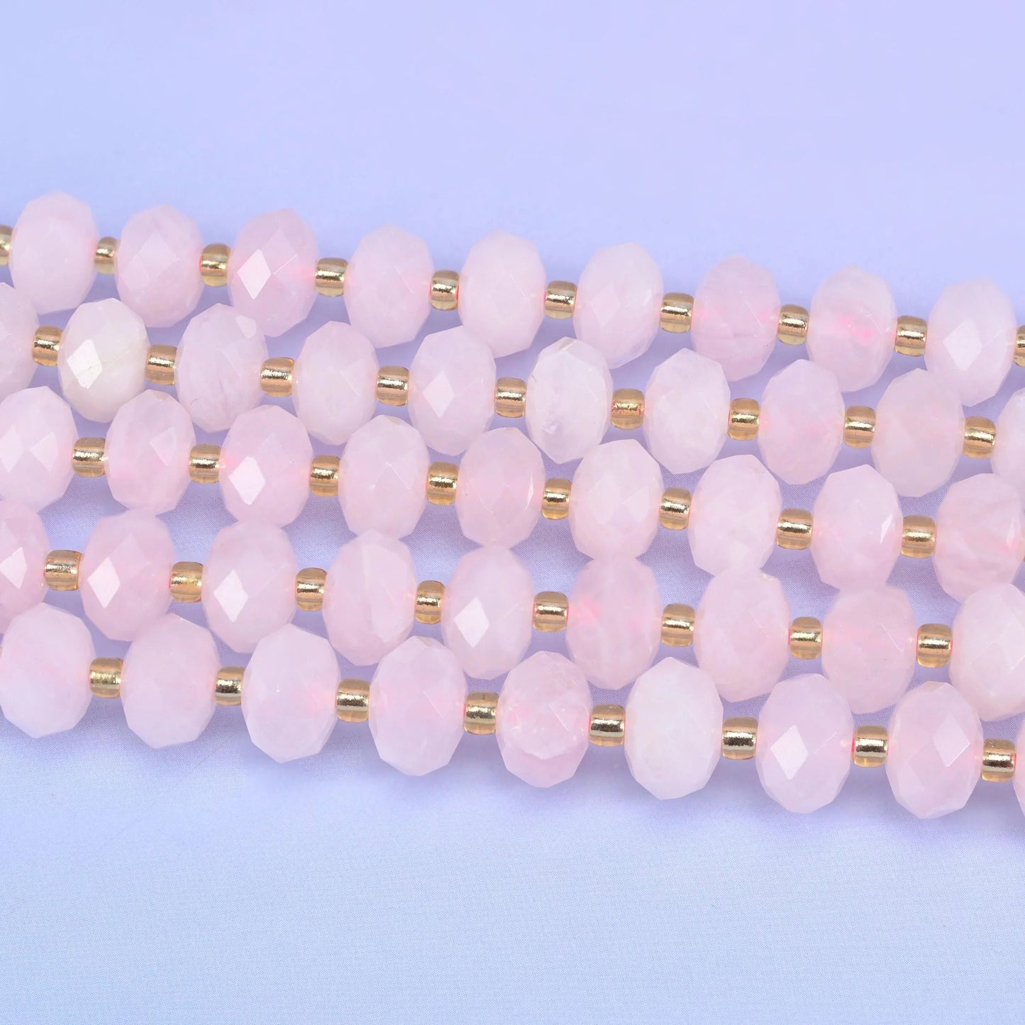 Faceted rondelle cut rose quartz beads