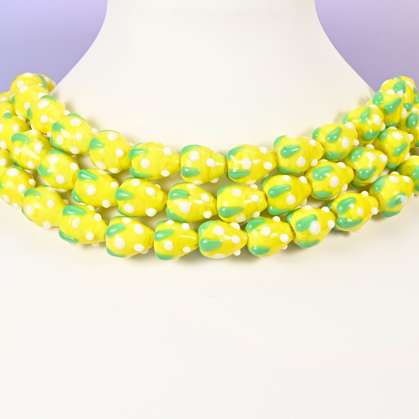 Strawberry glass beads, yellow with white dots, approximately 15.5x12mm
