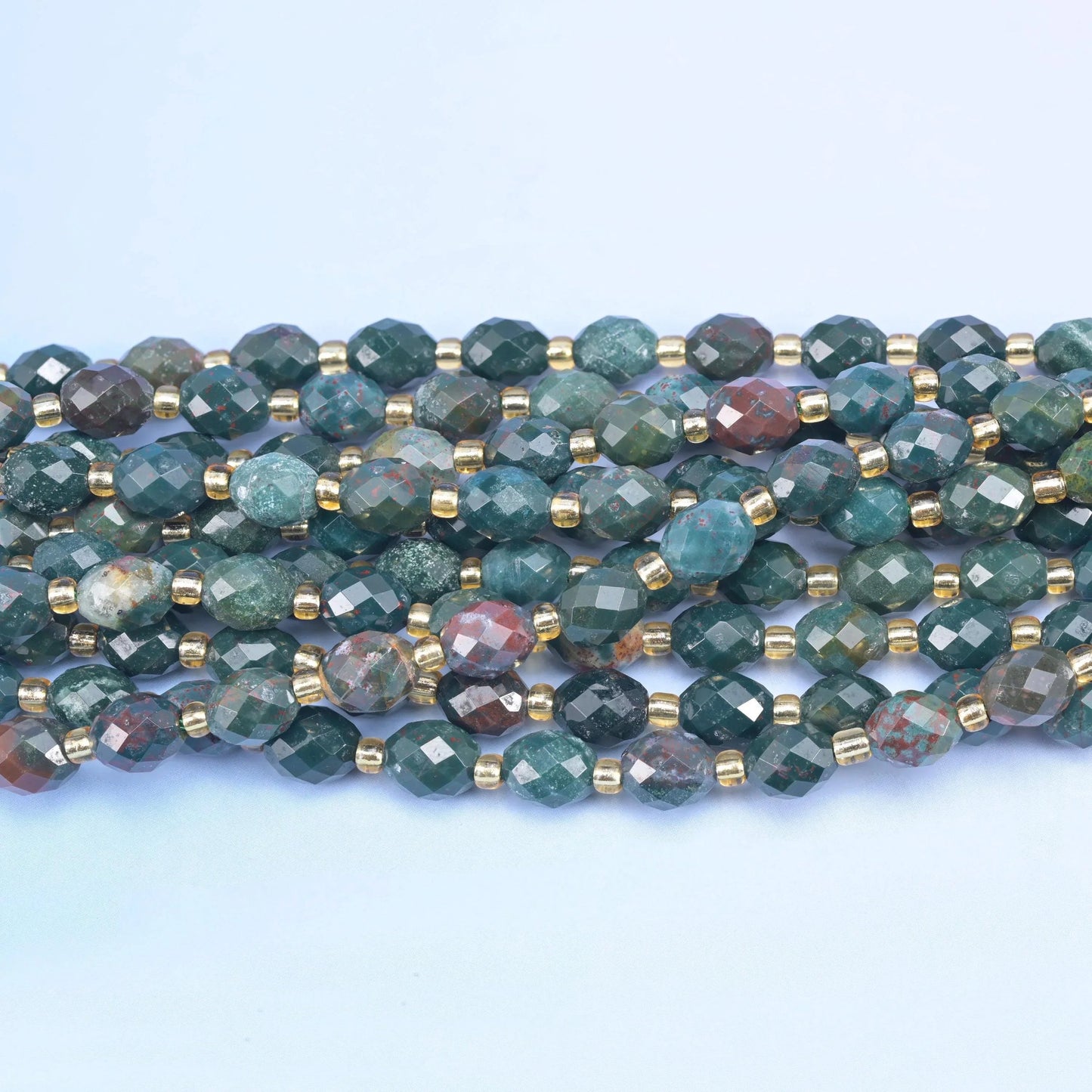 Faceted rice barrel cut oriental jasper beads