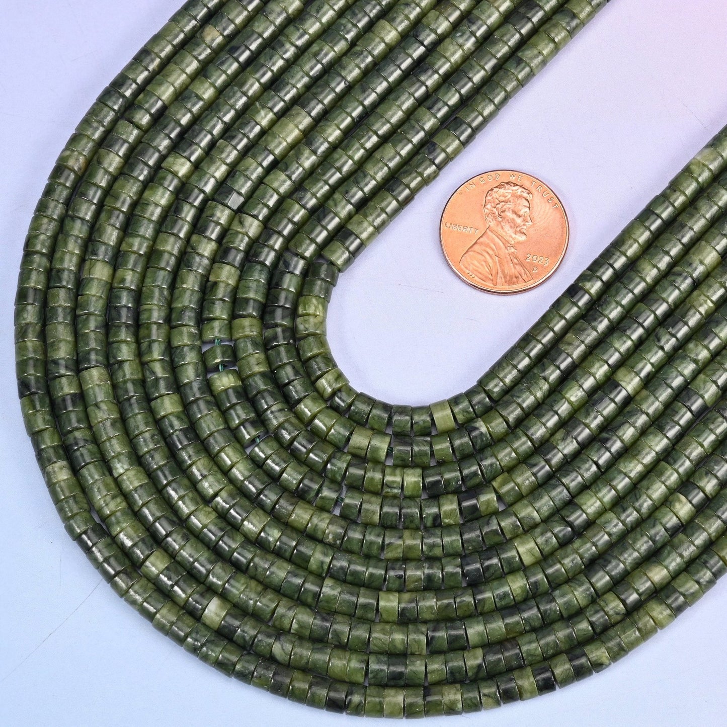 Smooth heishi disc cut South Jade beads