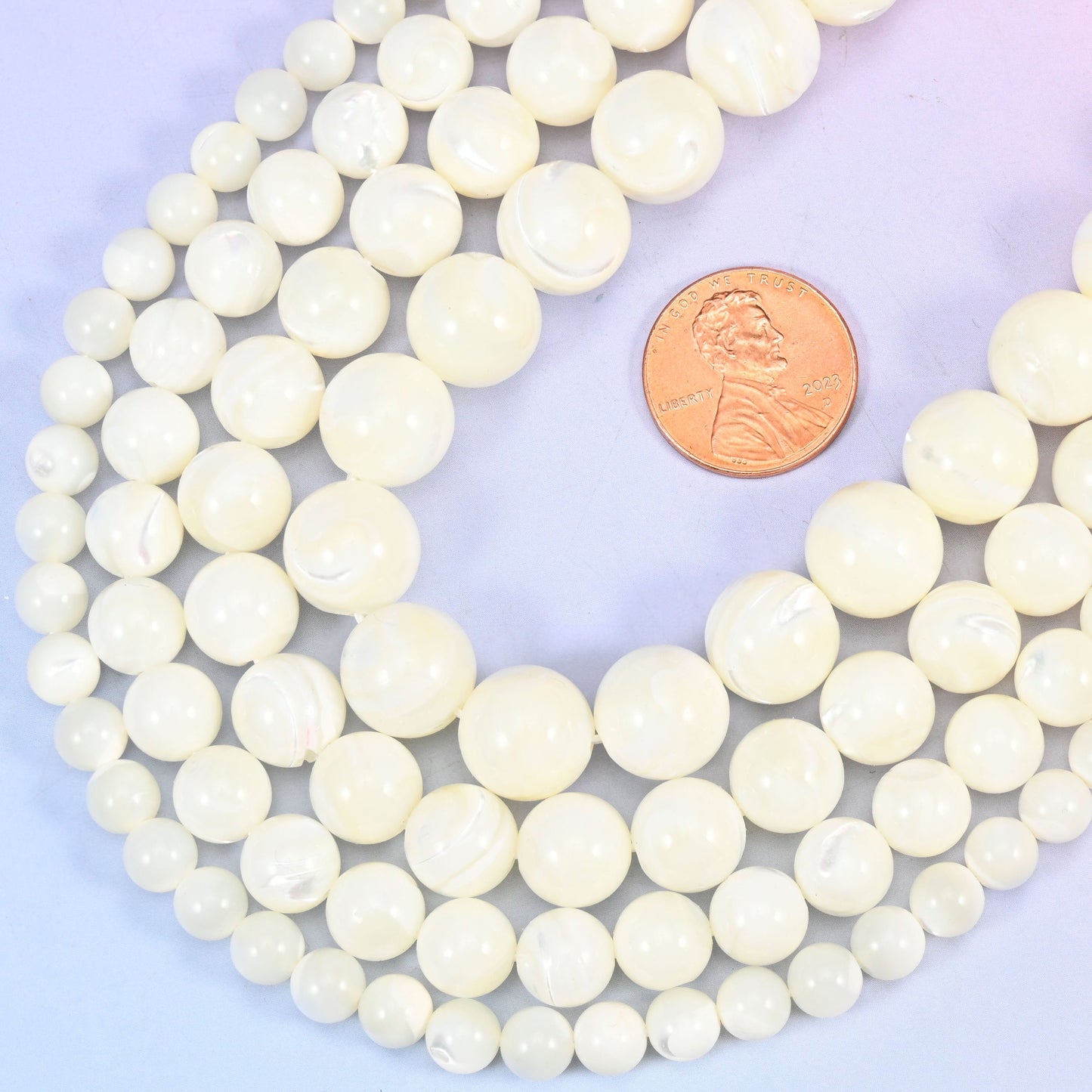 Round cut white trochus shell beads