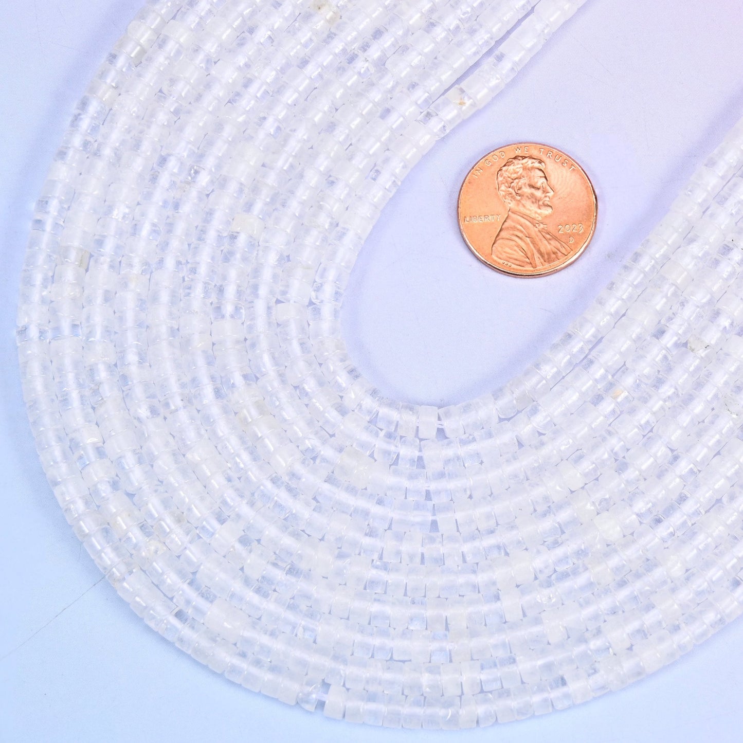 Smooth heishi disc cut clear quartz beads