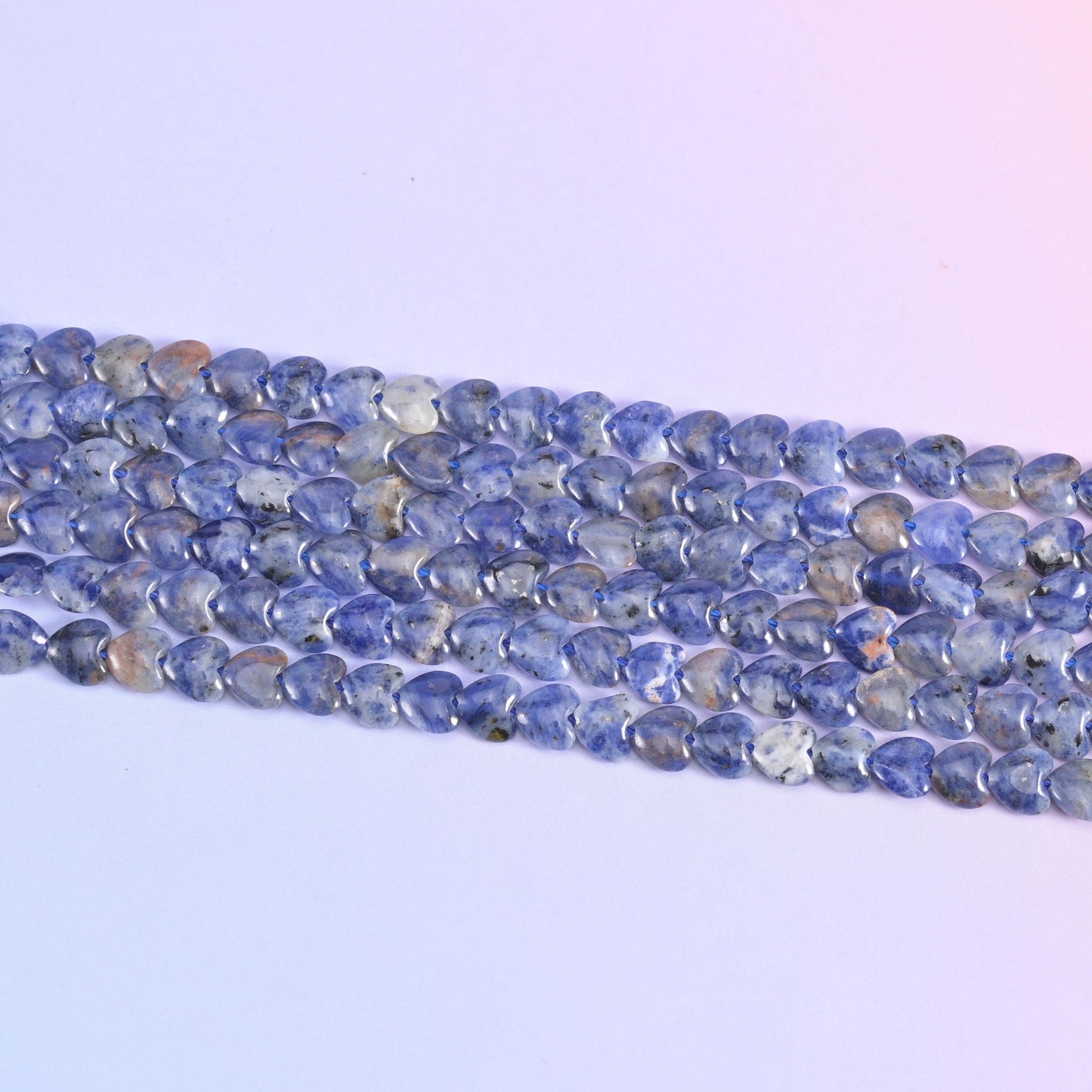 Blue Sodalite Flat Heart Beads 6mm in denim and royal blue marbled with chalk white and soft grey