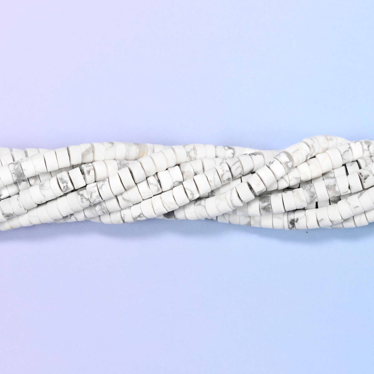 Matte white howlite heishi disc beads, approximately 155 per strand
