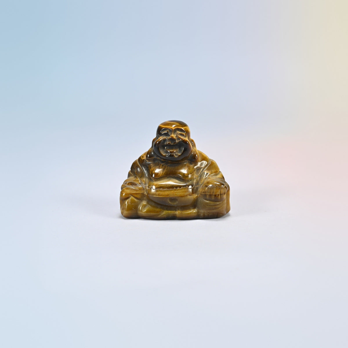 One tiger eye laughing Buddha crystal carving, golden brown natural stone with shimmering bands