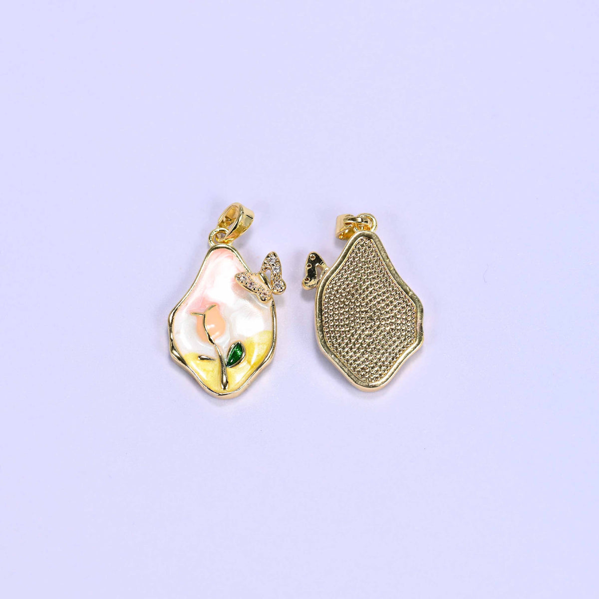 Tulip butterfly charm in pink and yellow enamel with a clear zirconia butterfly
