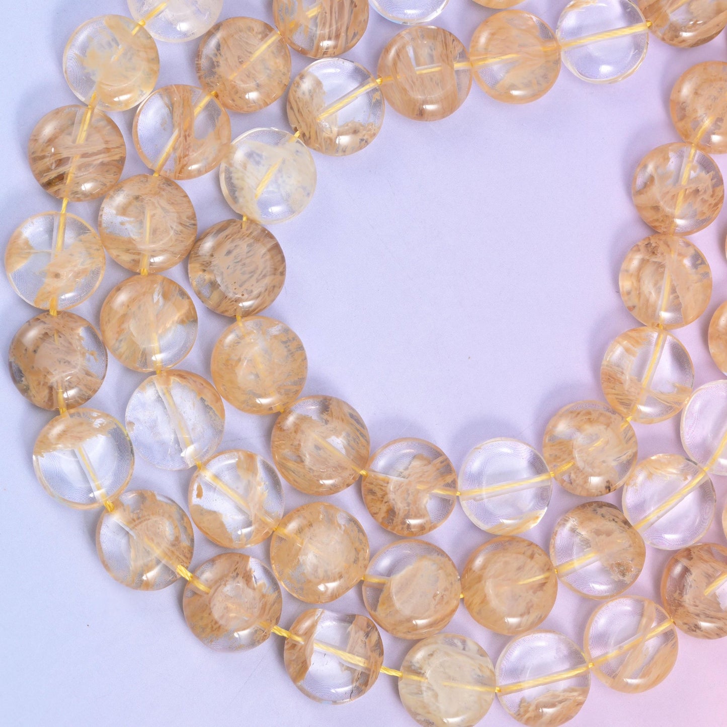 Yellow watermelon quartz coin beads, approximately 26 beads per strand