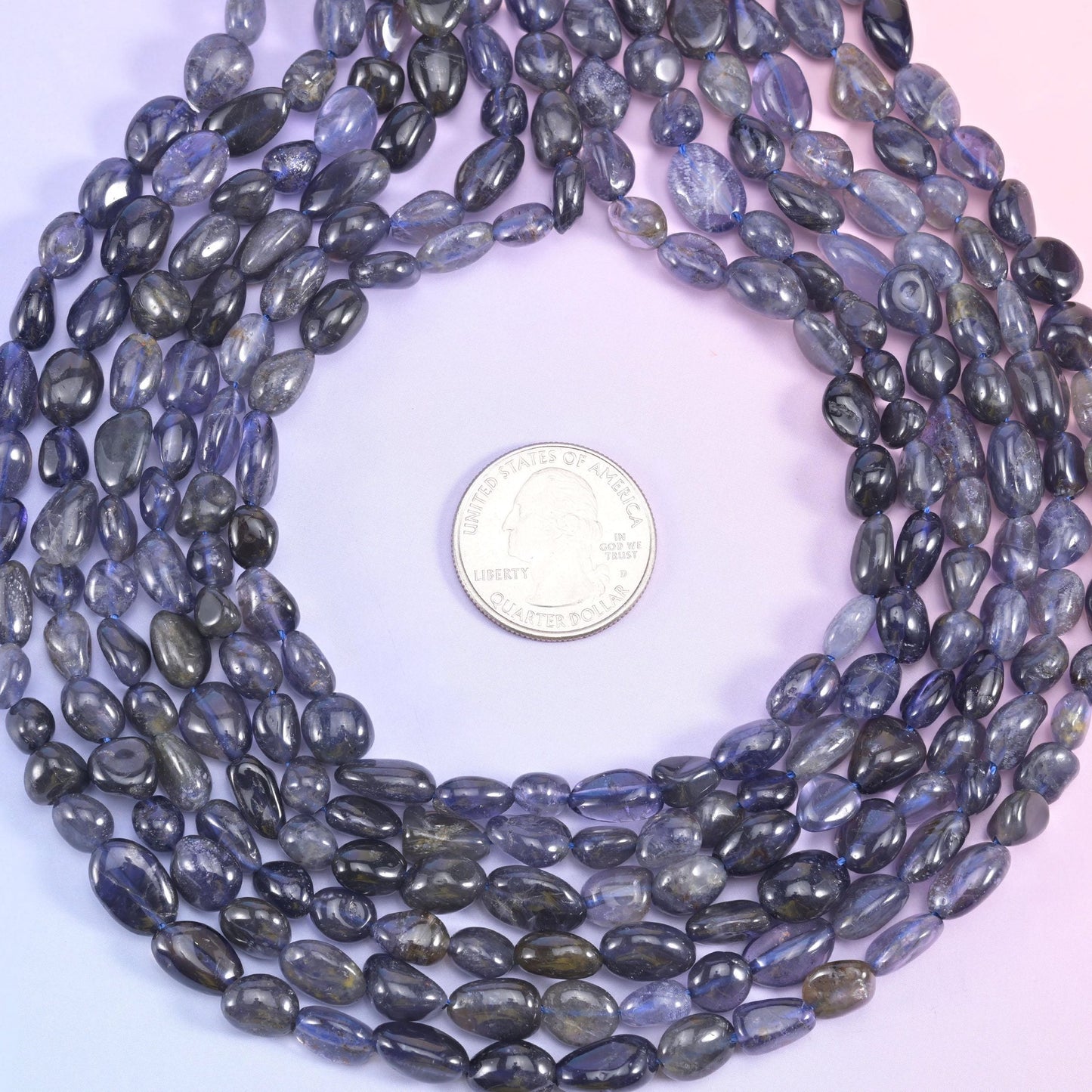 Iolite pebble nugget beads, approximately 46 beads per strand