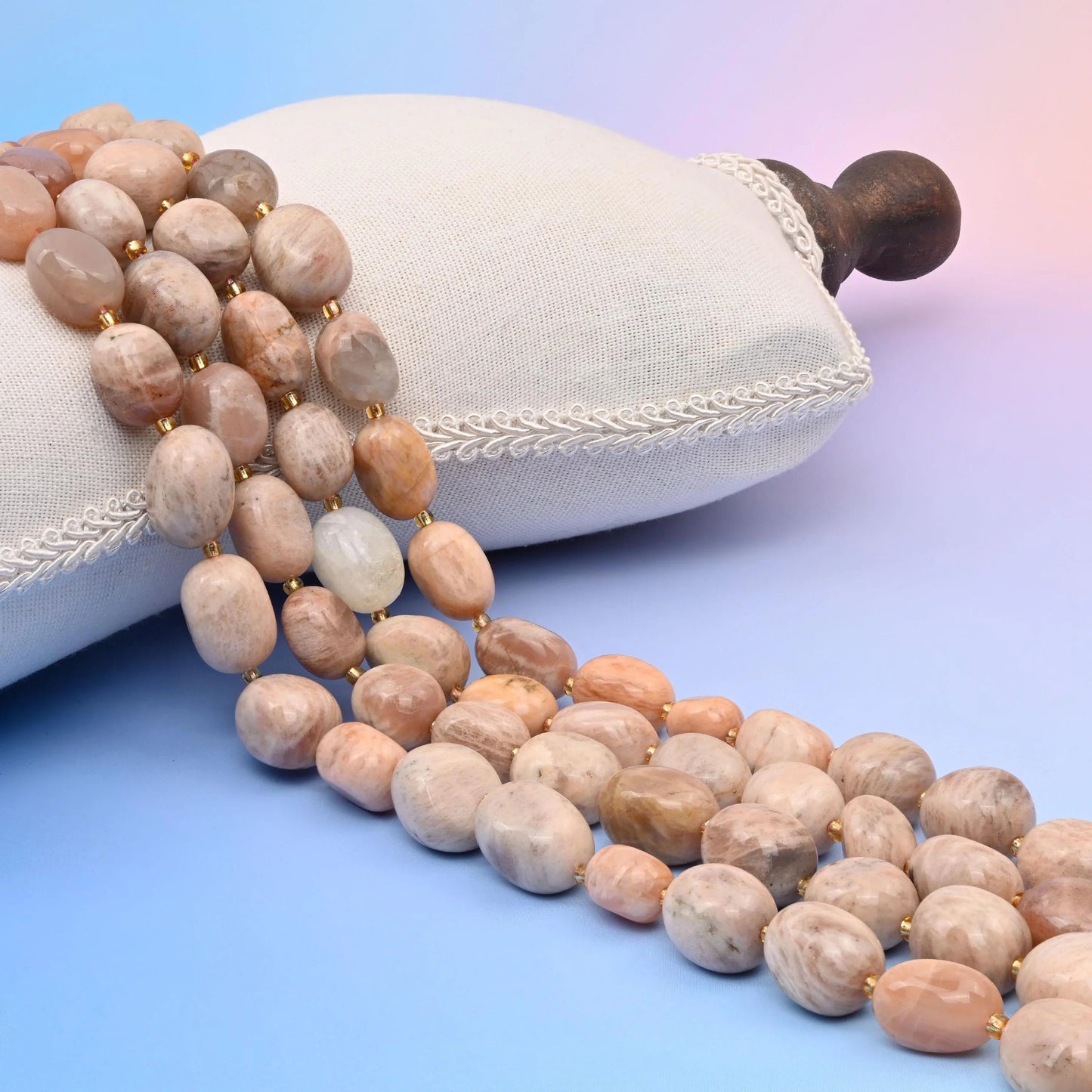 Natural Sunstone oval egg-shaped beads with a warm, radiant glow